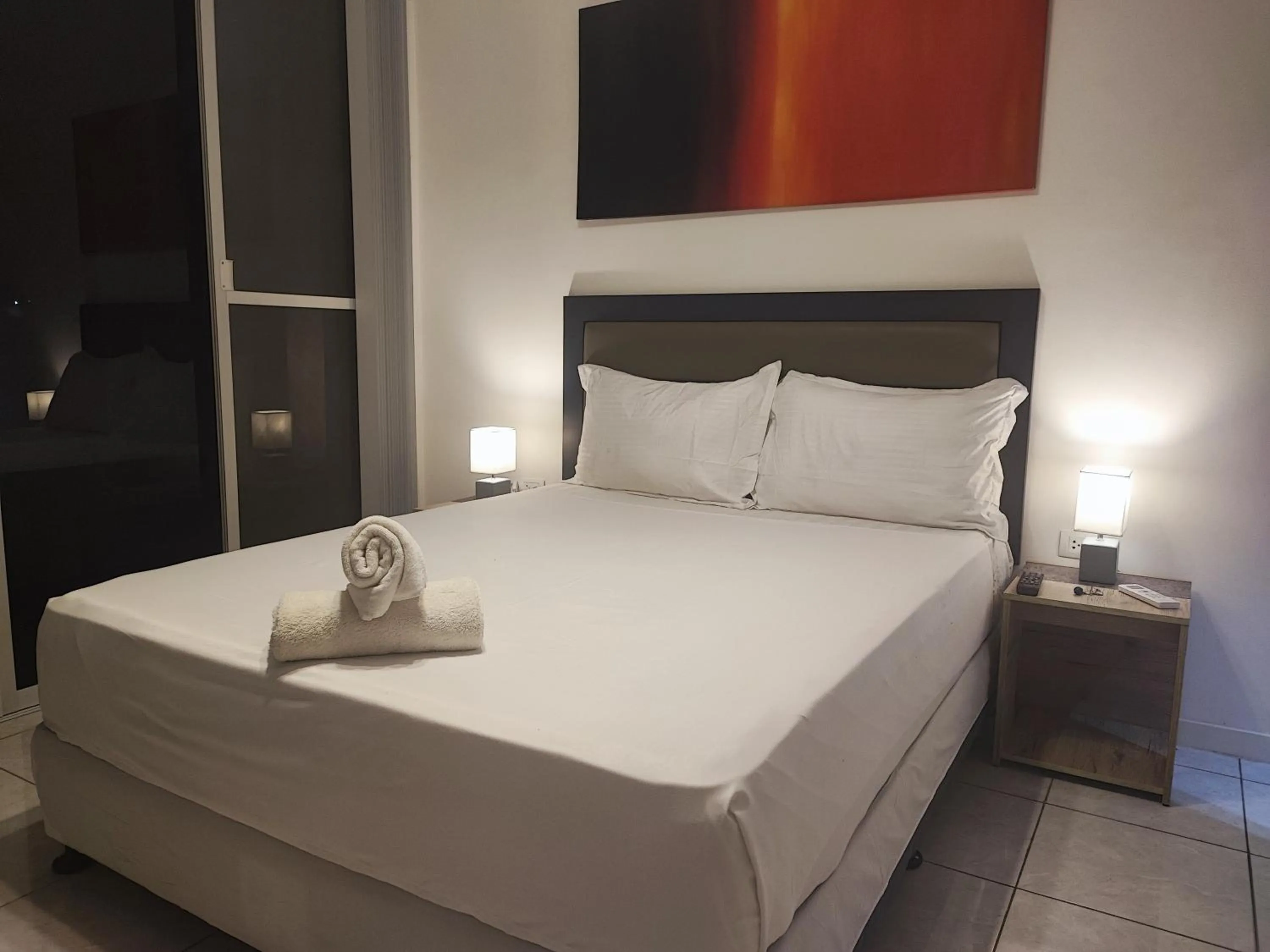 Bed in Bonsai Jacuzzi Suites