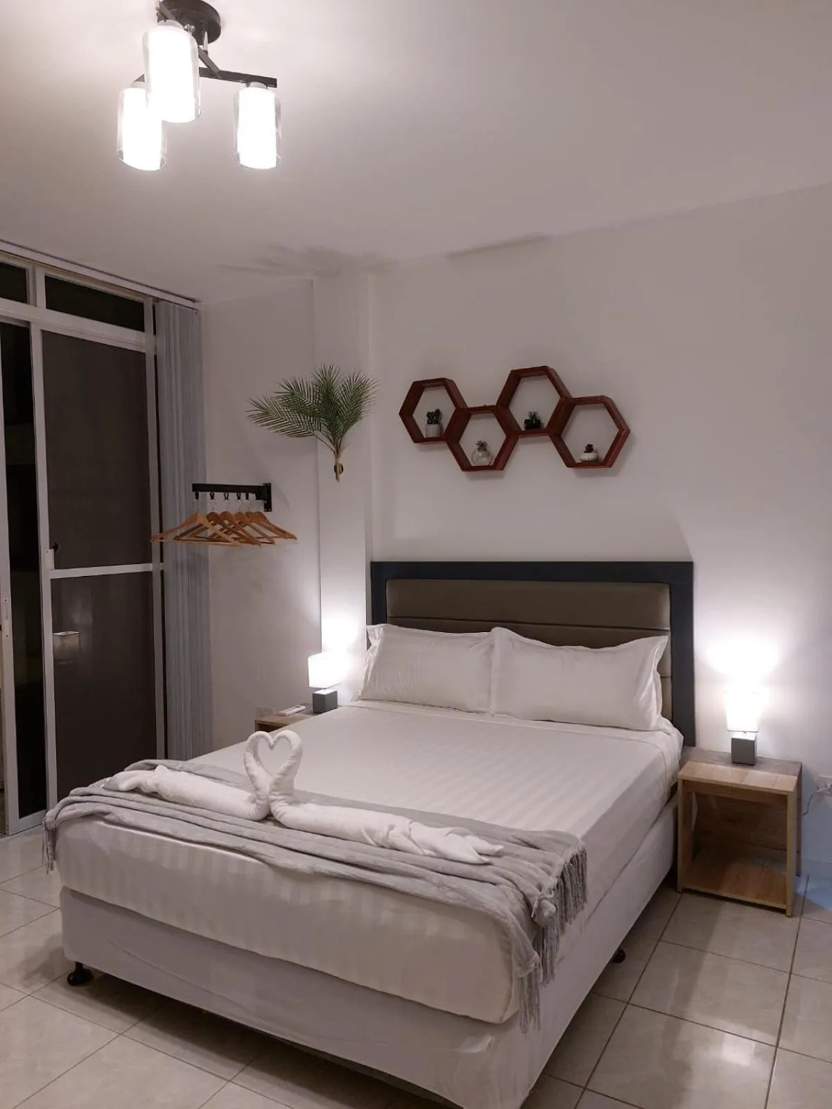 Bed in Bonsai Jacuzzi Suites