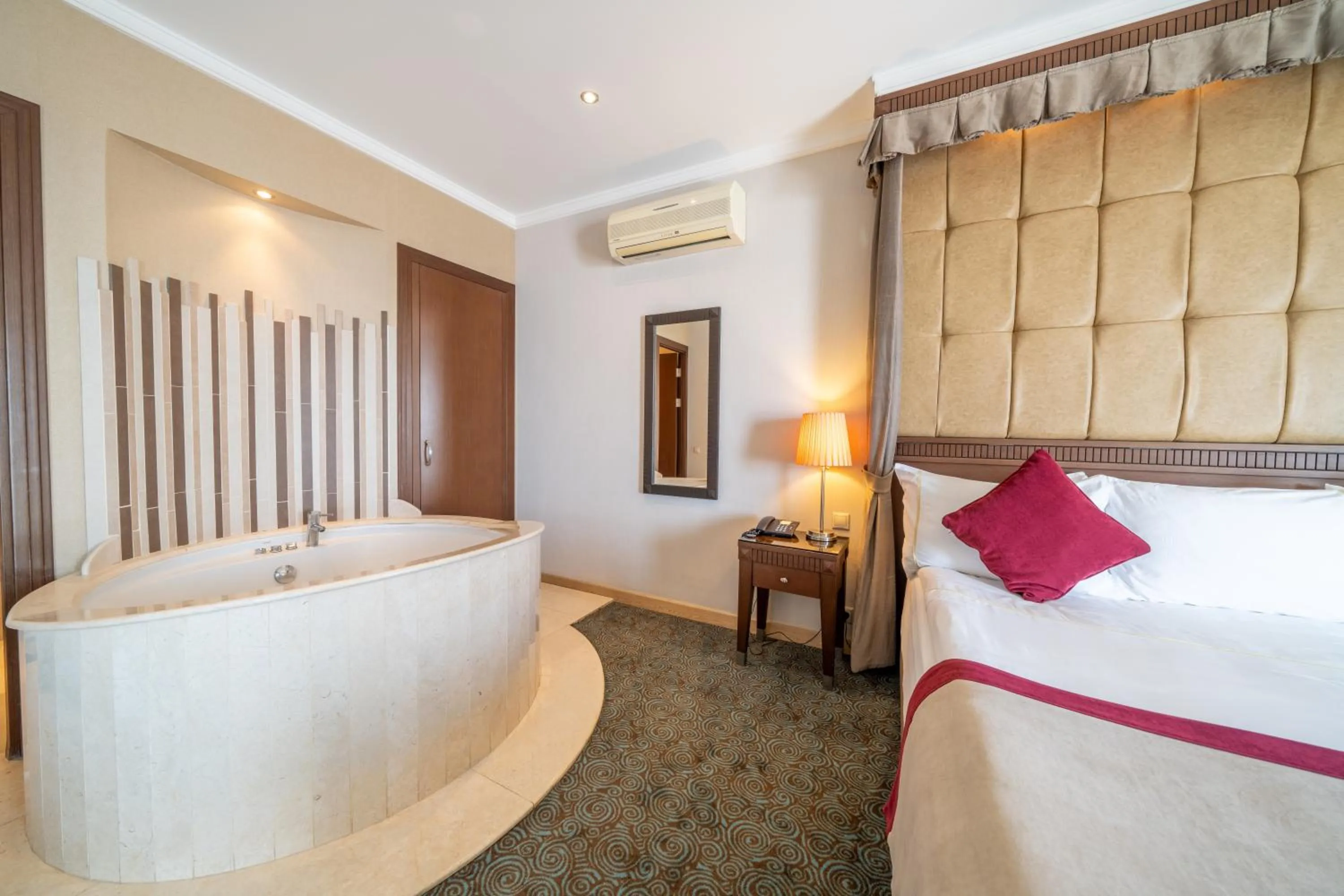 Bed in Korumar Hotel Deluxe