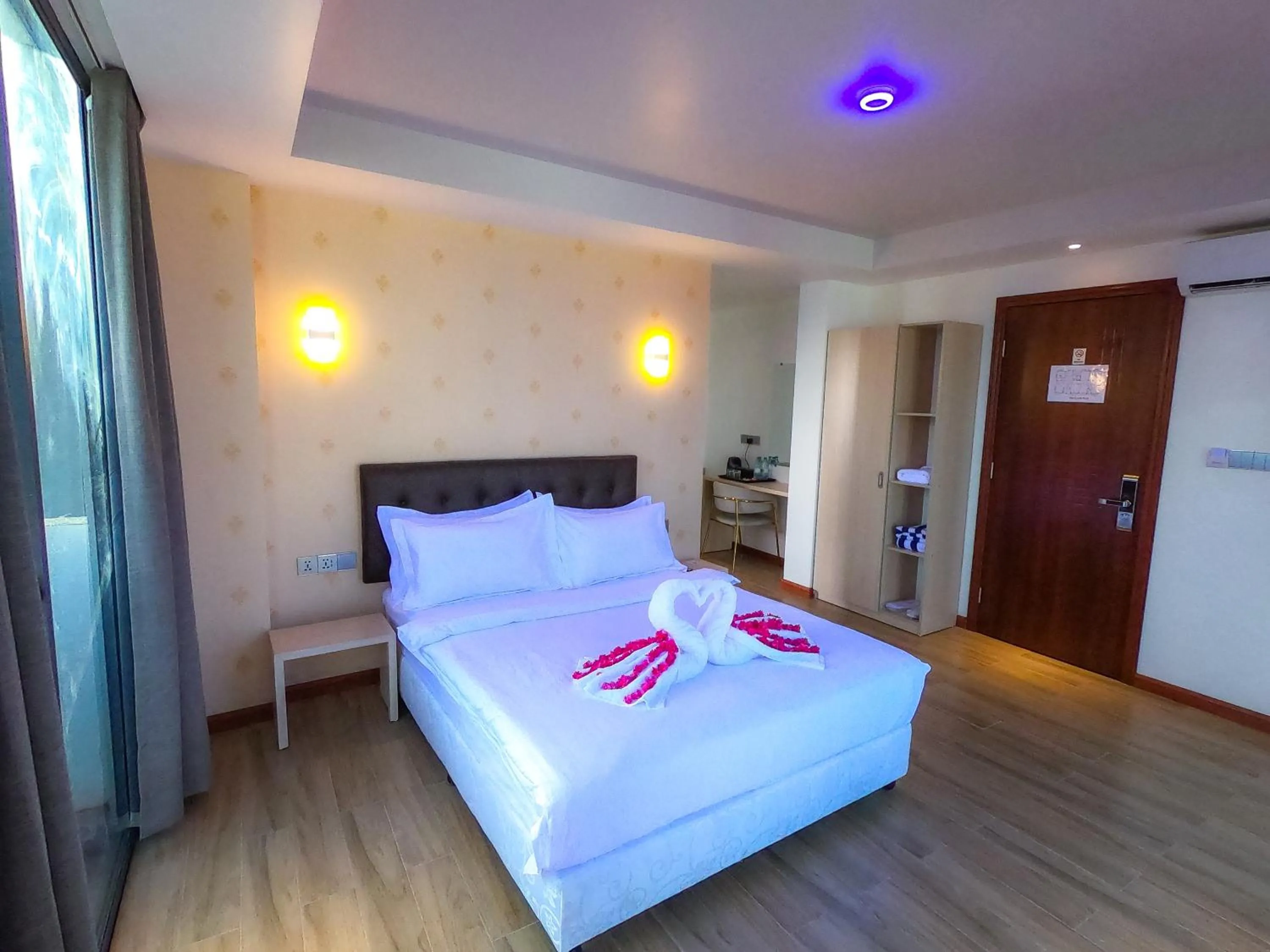 Bed in Ari Grand Hotel & Spa