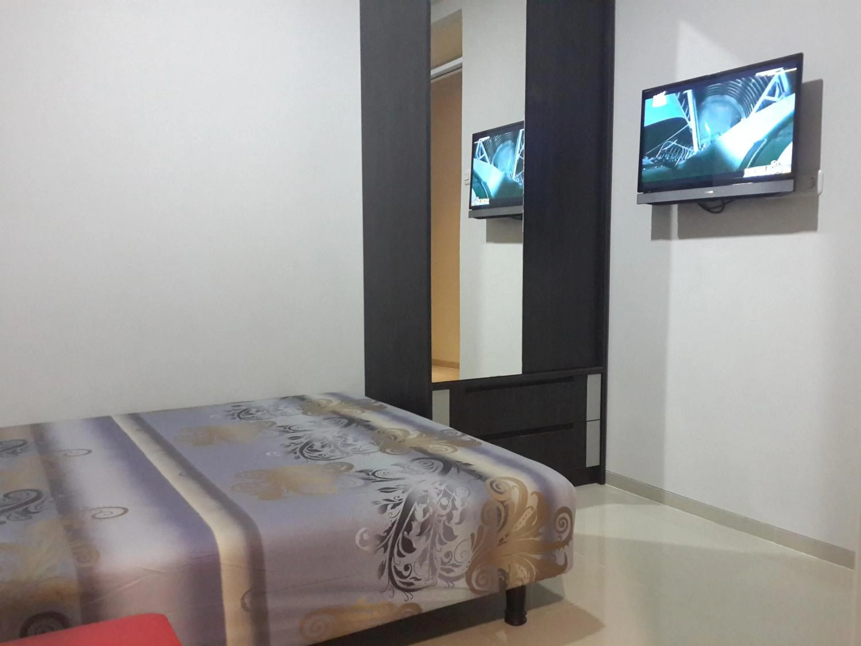 Decorative detail, TV/Entertainment Center in iHome Residence