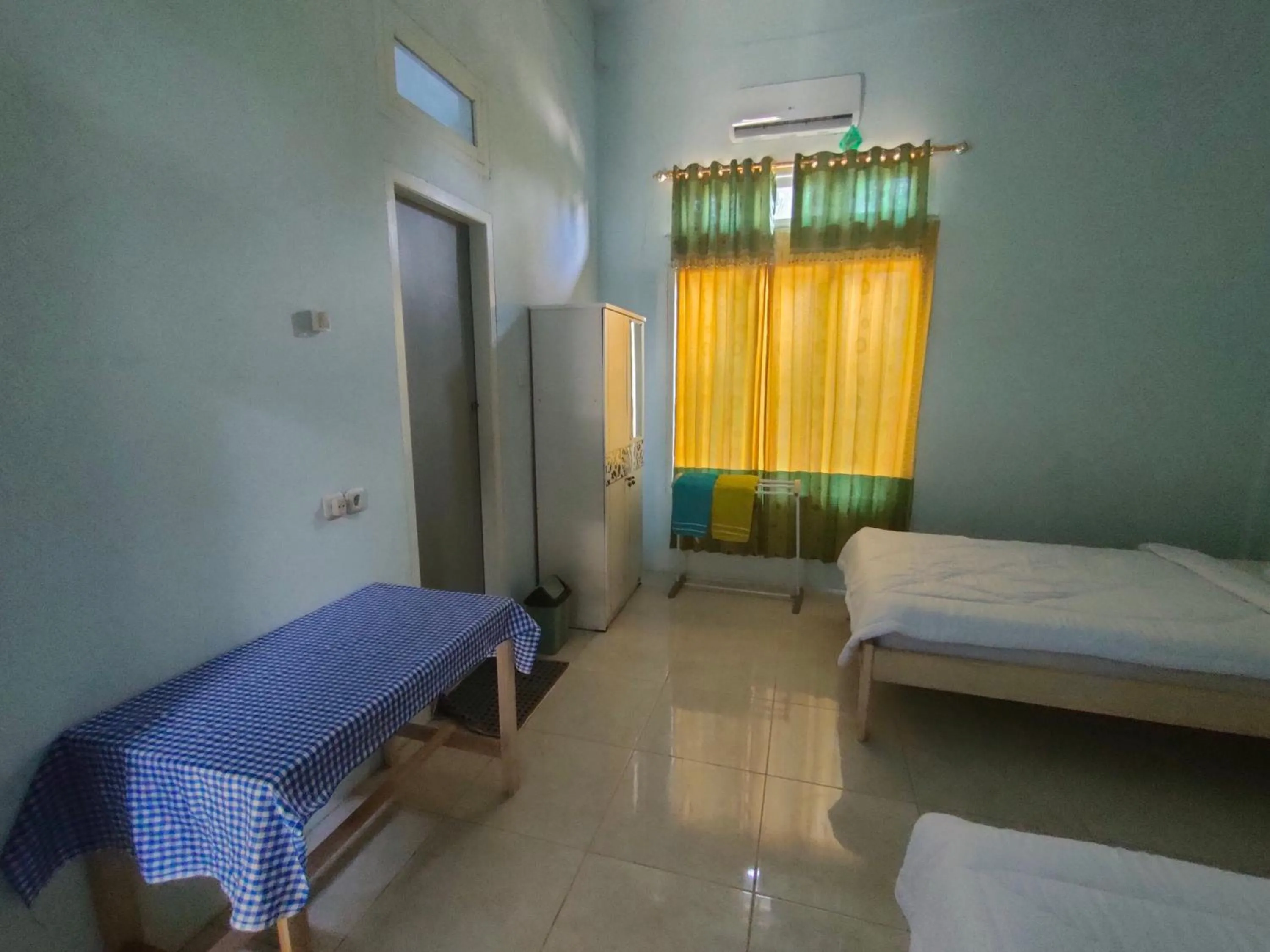 Bed in Tangkoko Guest House