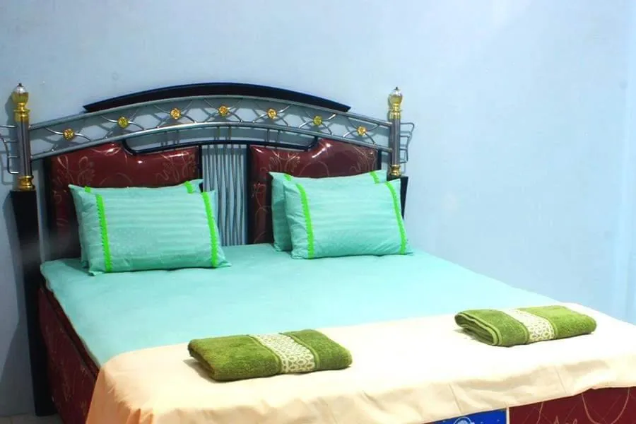 Bed in Tangkoko Guest House