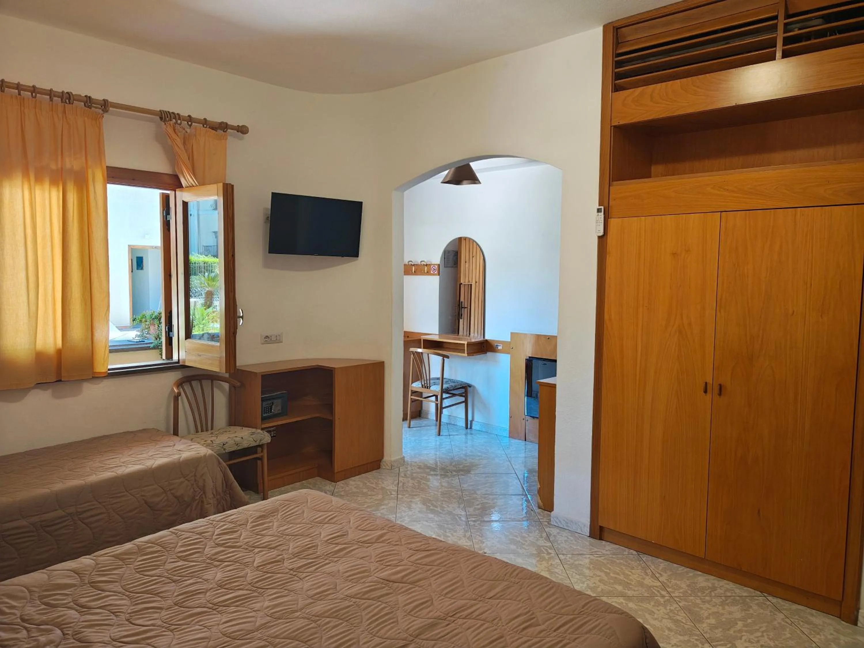 TV and multimedia, Bed in Hotel La Filadelfia