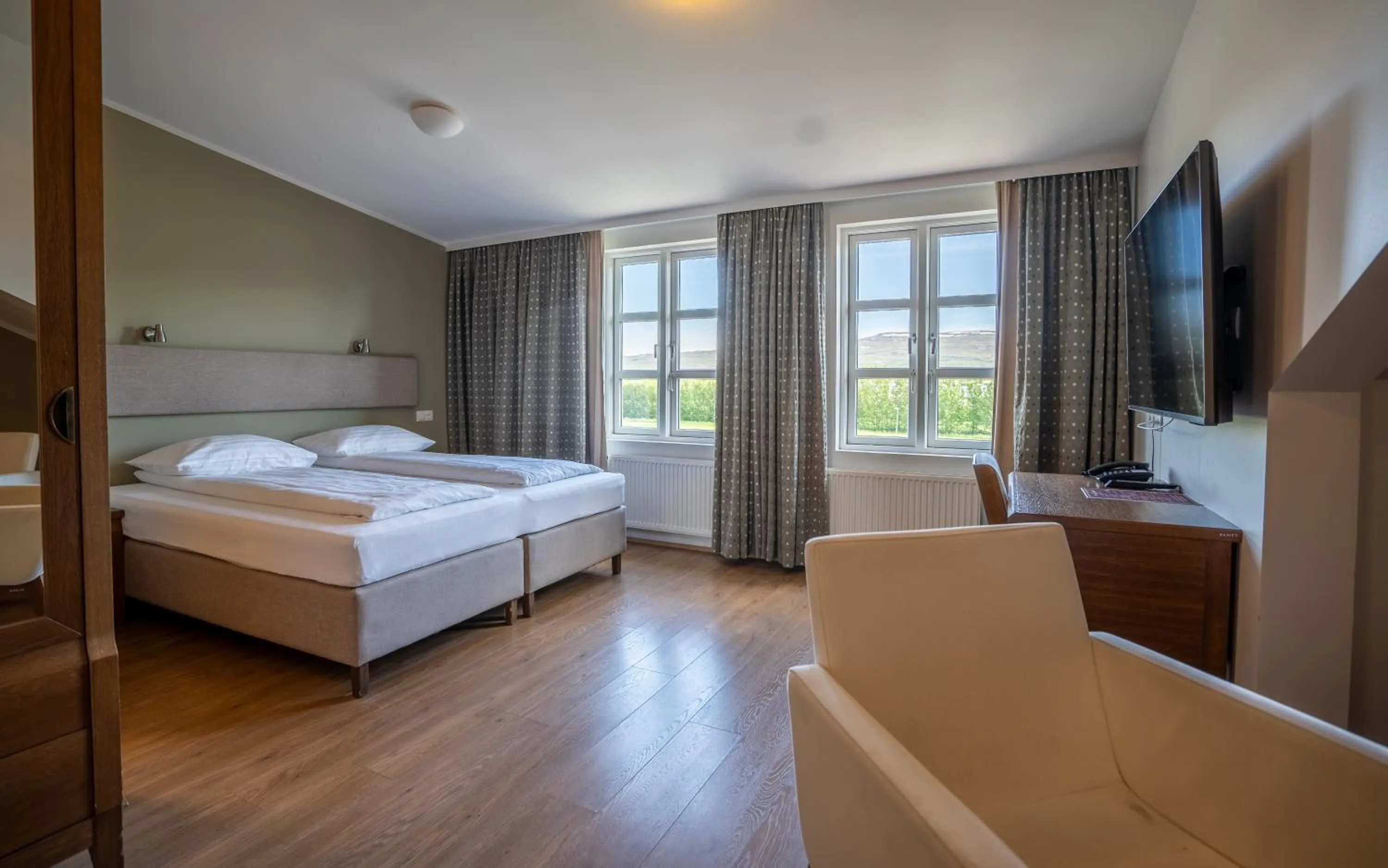 Bedroom, Bed in Gistihúsið - Lake Hotel Egilsstadir