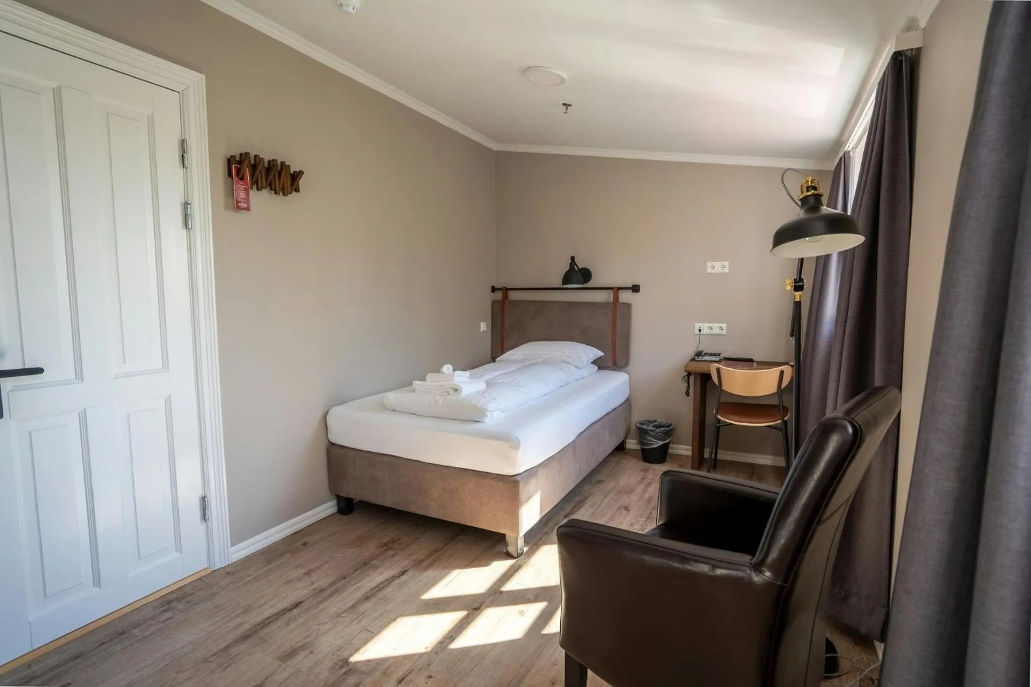 Bedroom, Bed in Gistihúsið - Lake Hotel Egilsstadir