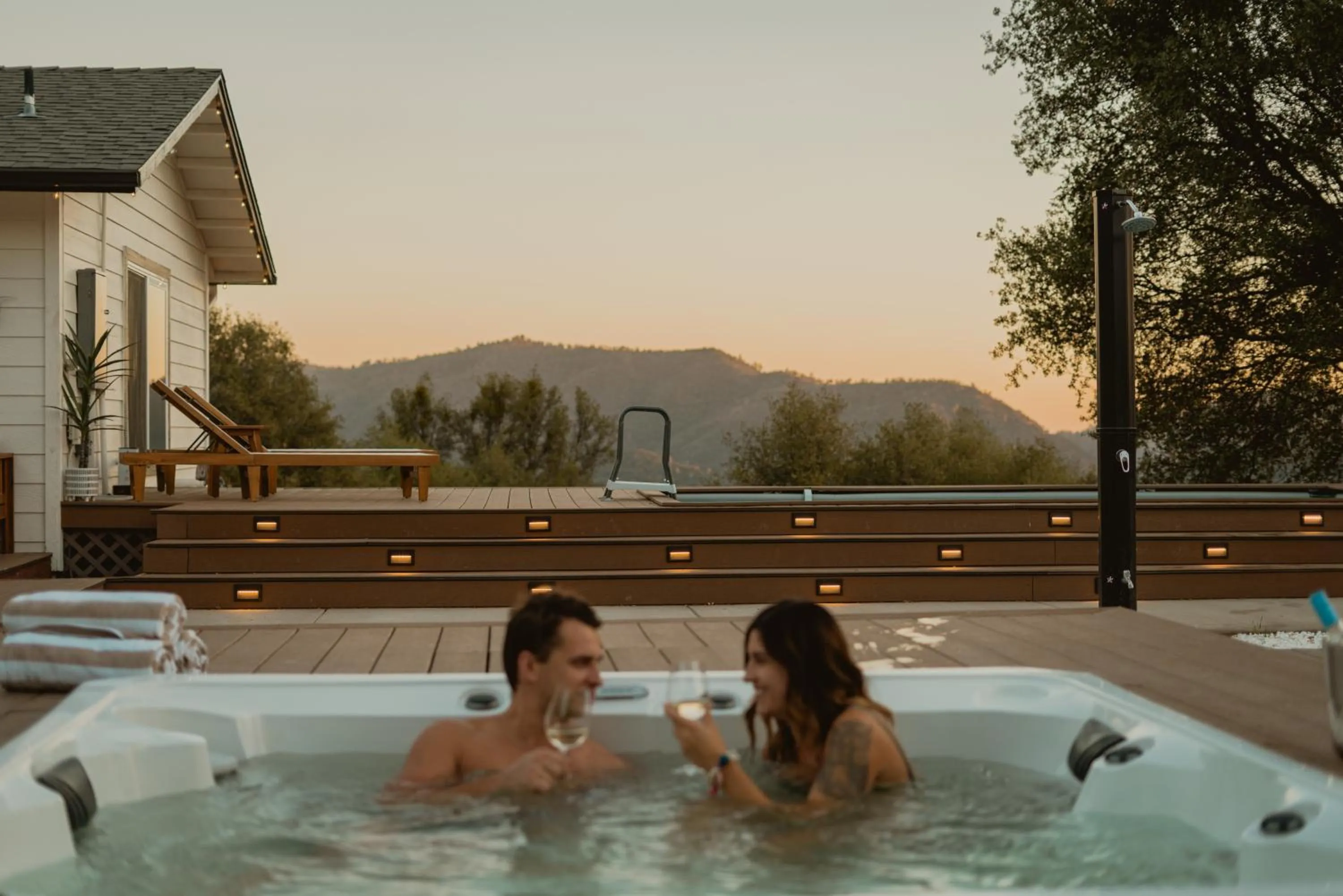 People in Boho chic oasis by Casa Oso with pool, spa and views