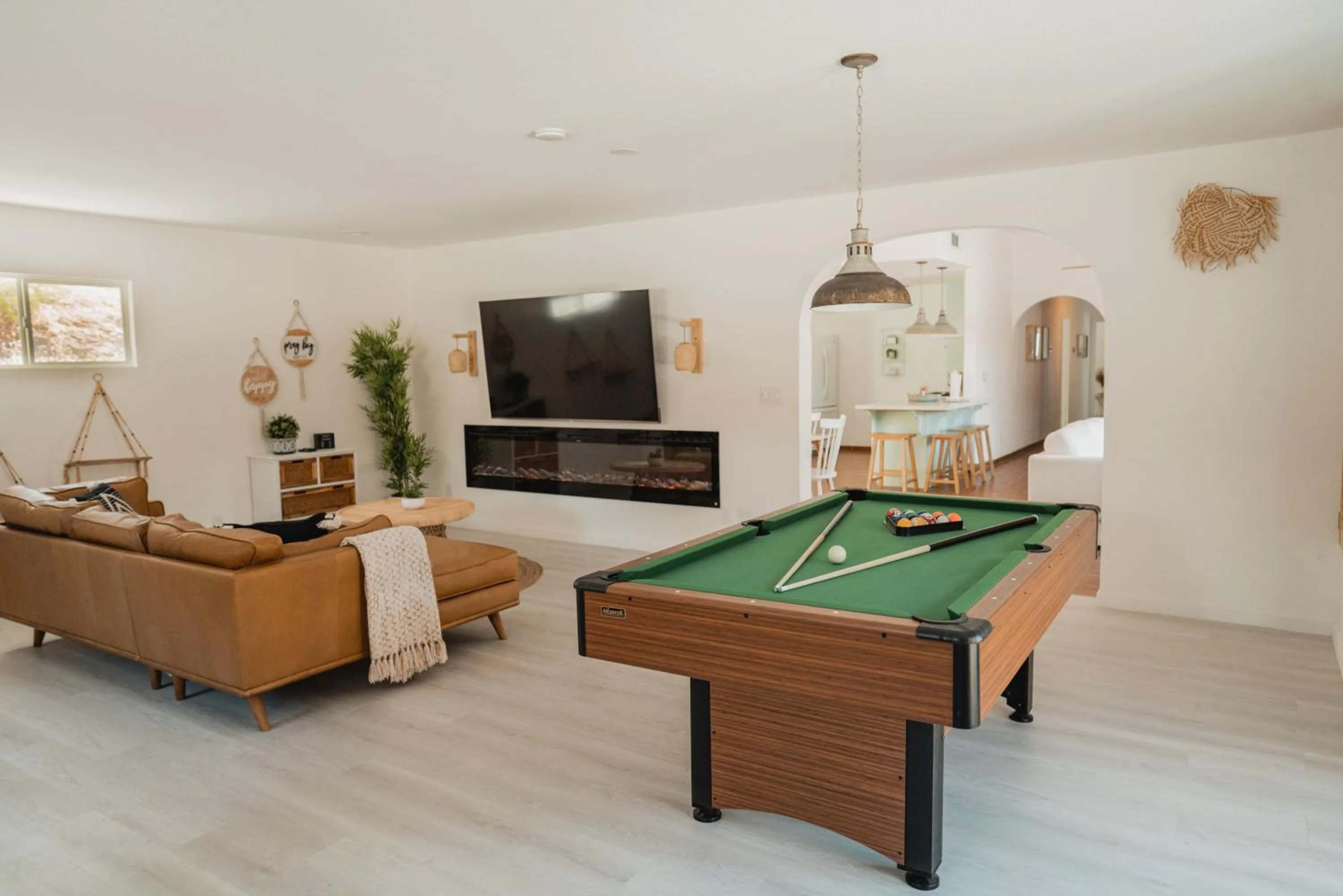 Communal lounge/ TV room in Boho chic oasis by Casa Oso with pool, spa and views