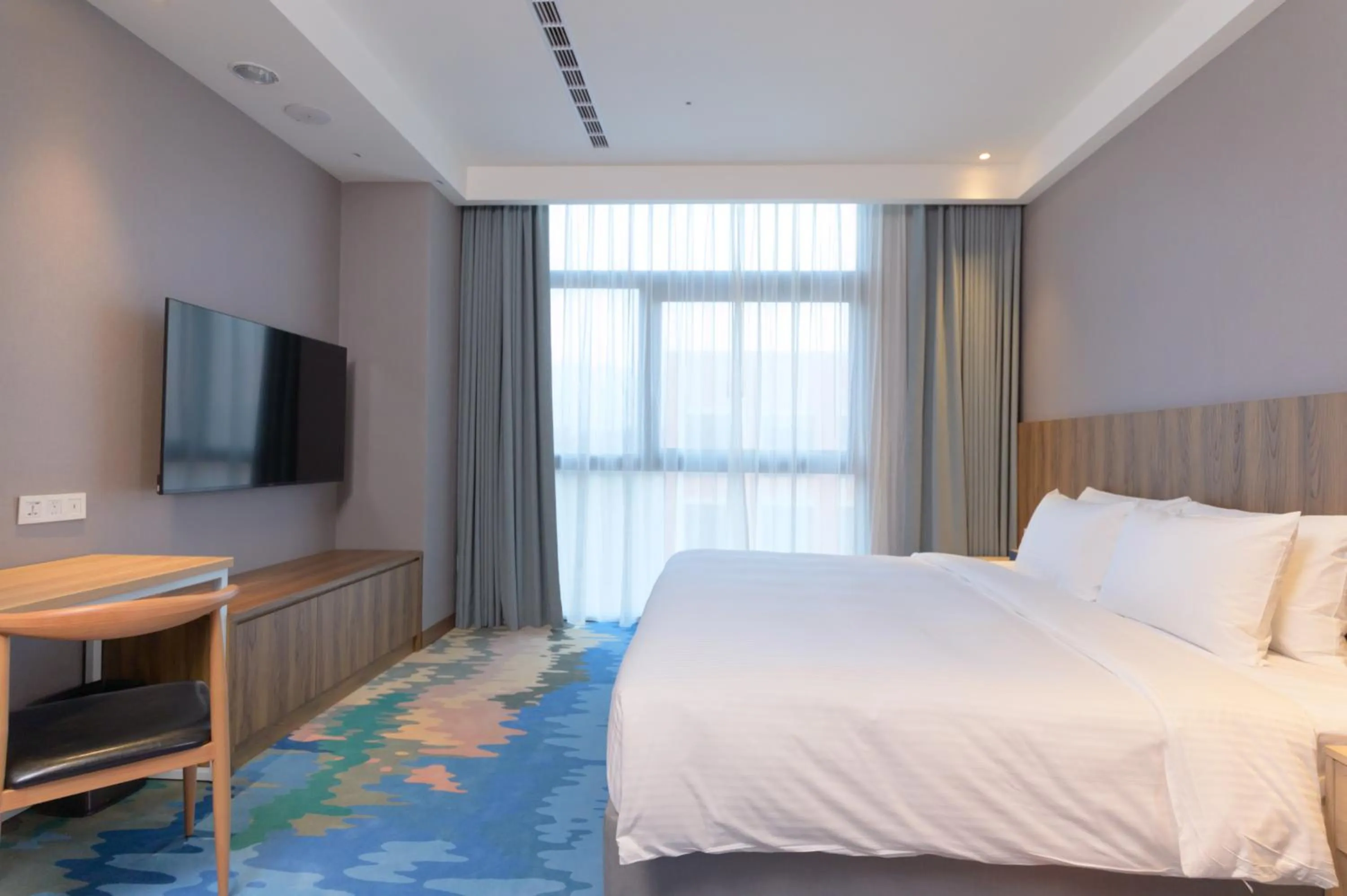 Bedroom, Bed in JANDA Golden Tulip Hotel