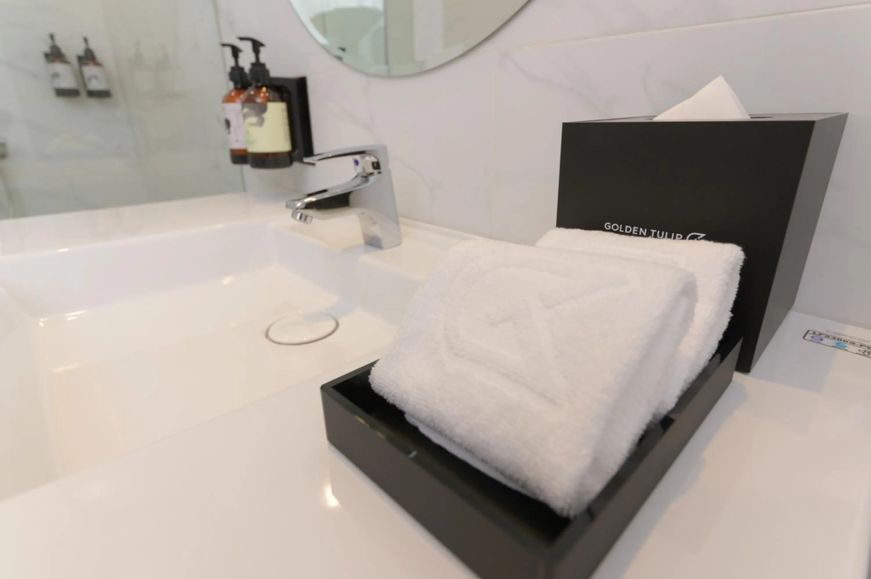 towels, Bed in JANDA Golden Tulip Hotel