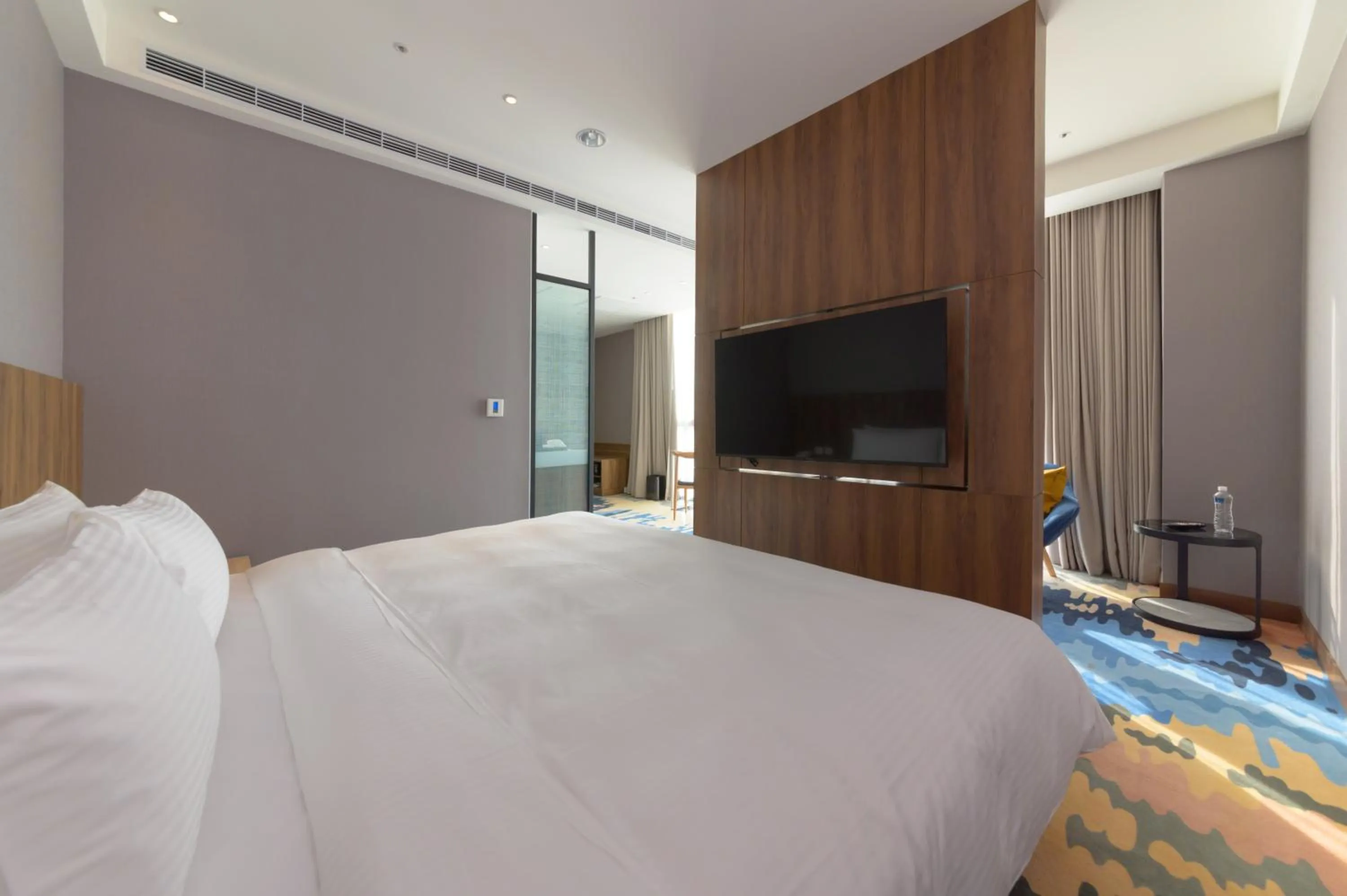 Bed in JANDA Golden Tulip Hotel