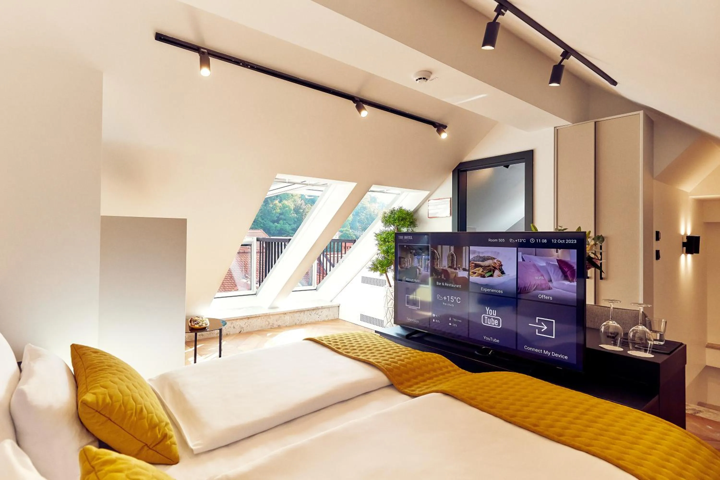 Bed in The Hotel Ljubljana