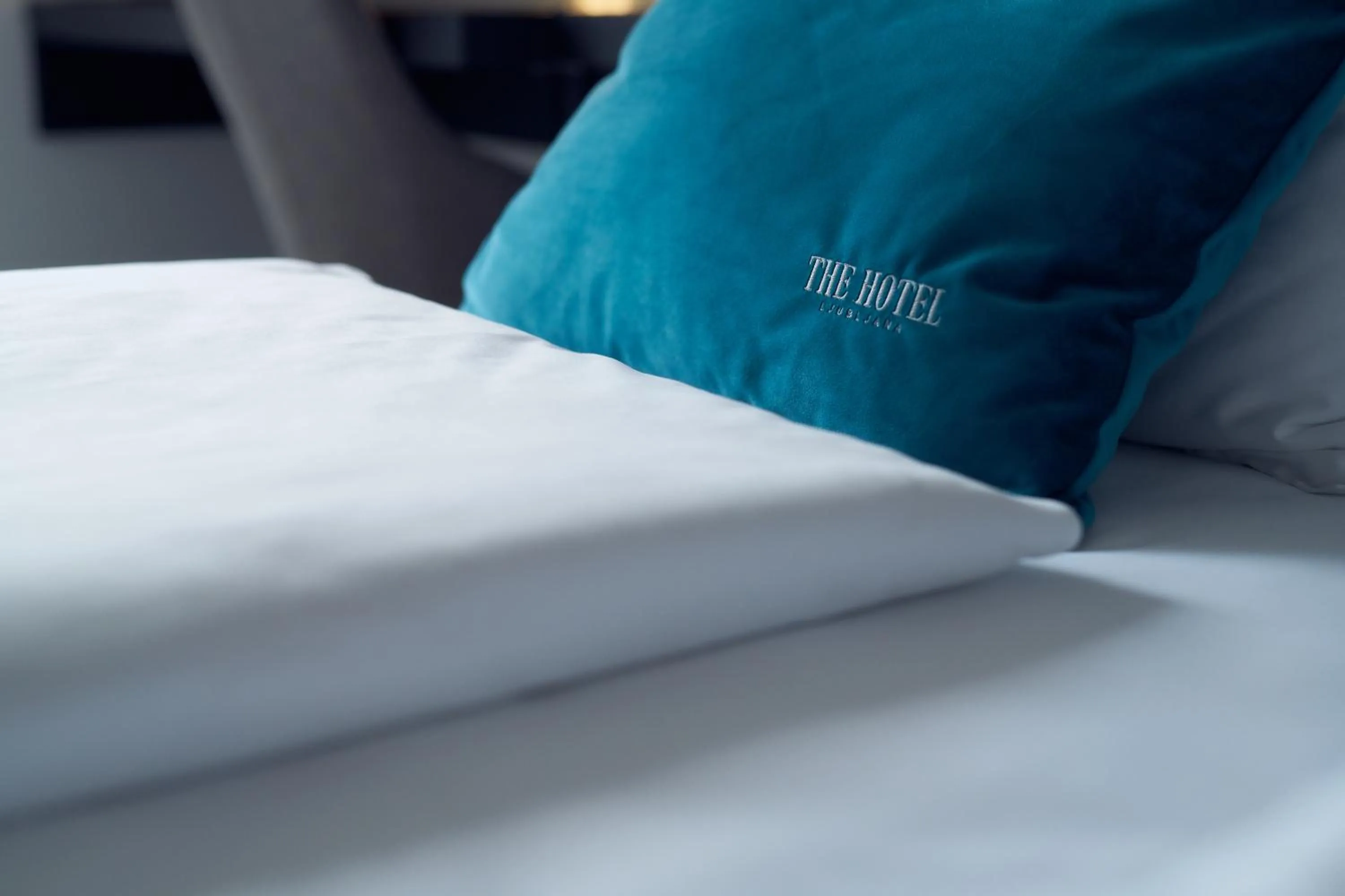 Bed in The Hotel Ljubljana