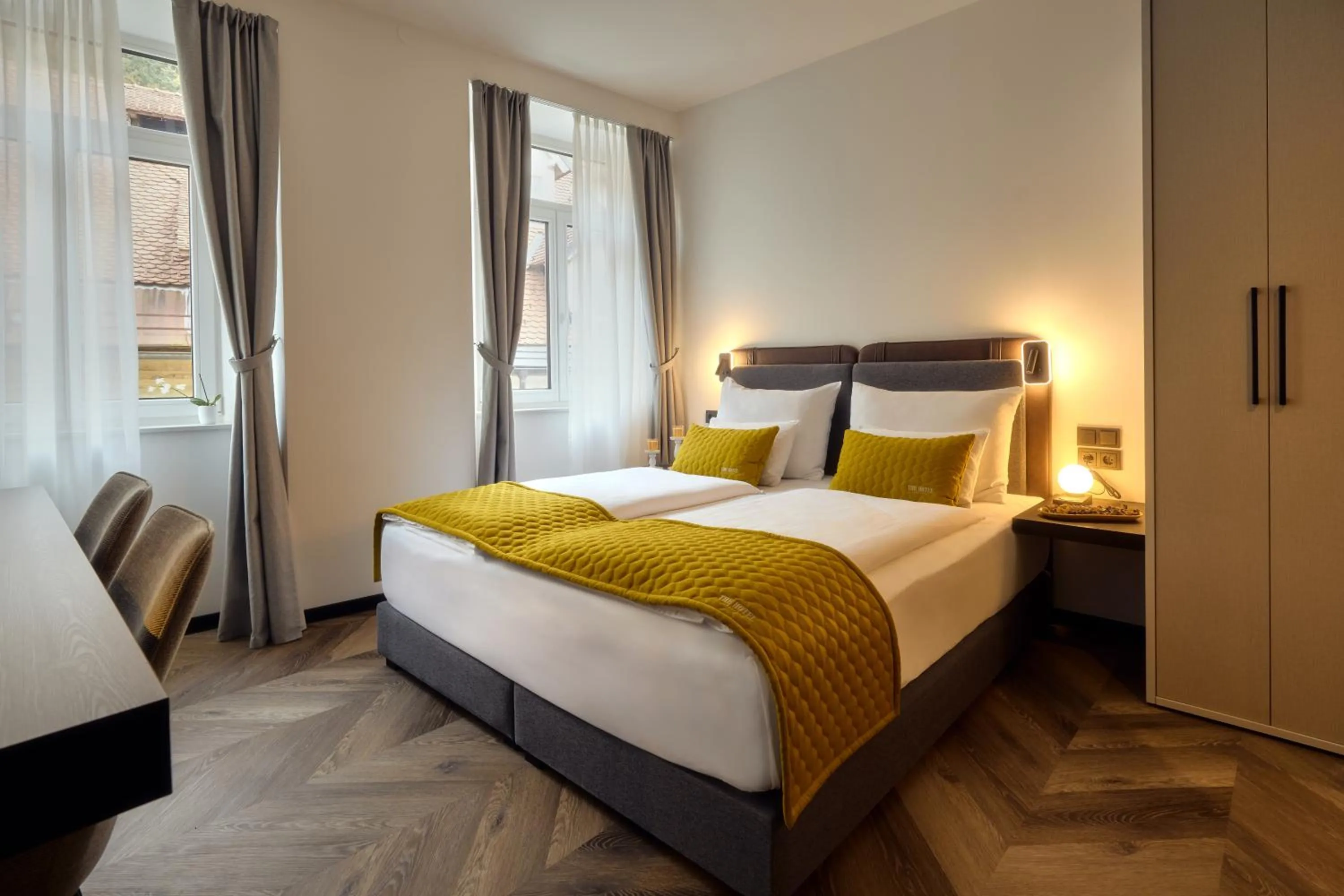 Bed in The Hotel Ljubljana