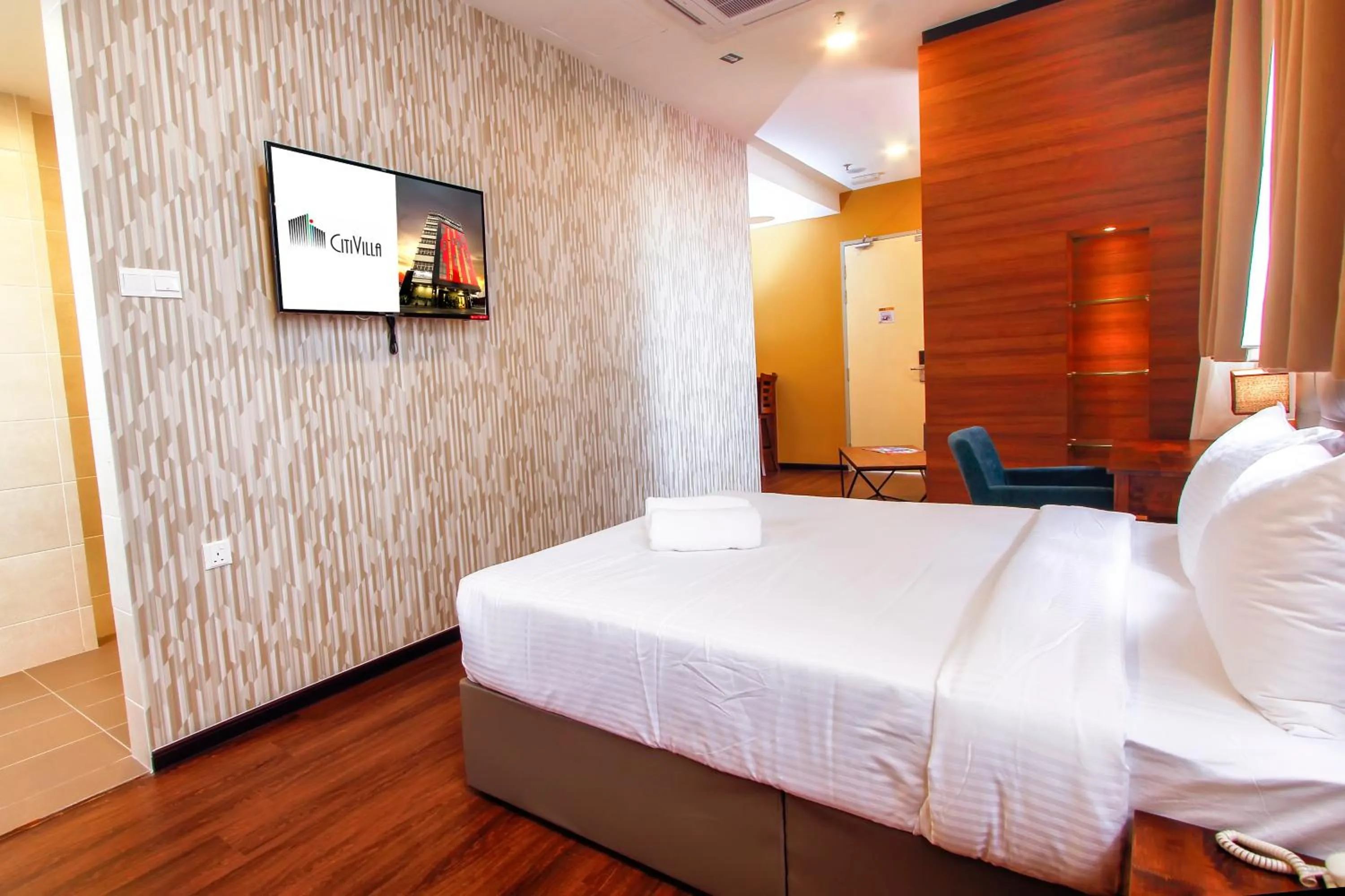 Bed in CitiVilla Hotel Penang