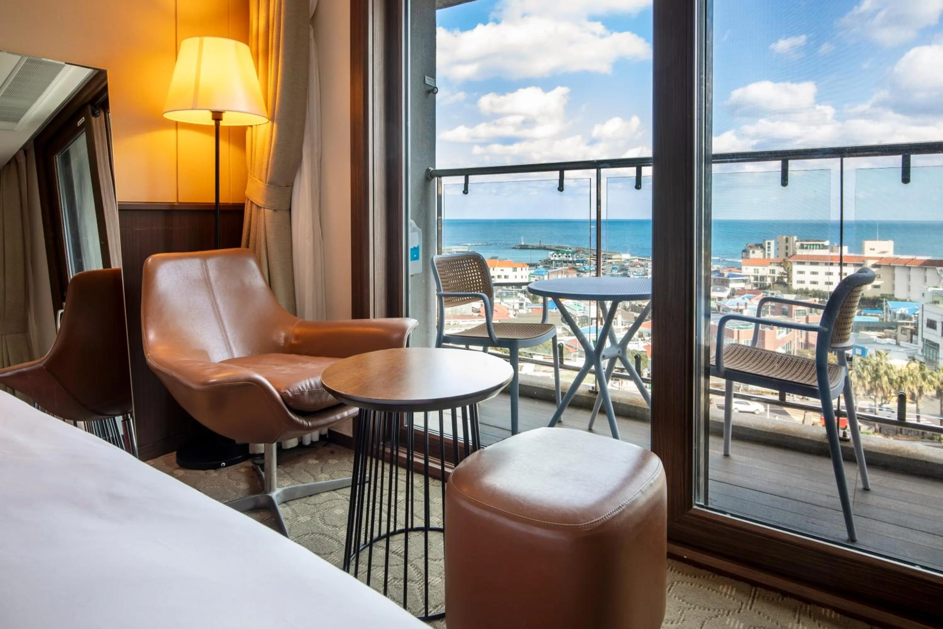 Bed in Ramada by Wyndham Jeju Hamdeok