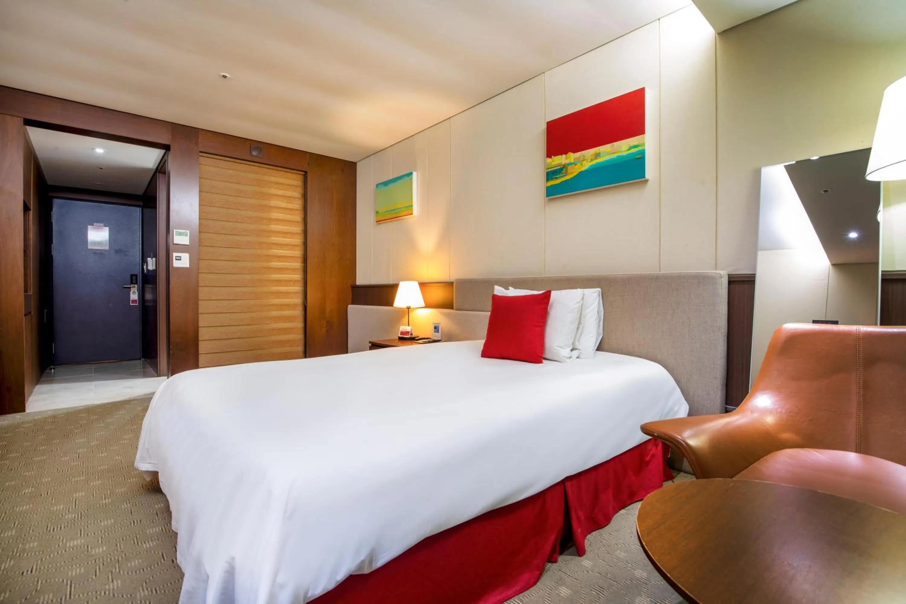 Bed in Ramada by Wyndham Jeju Hamdeok