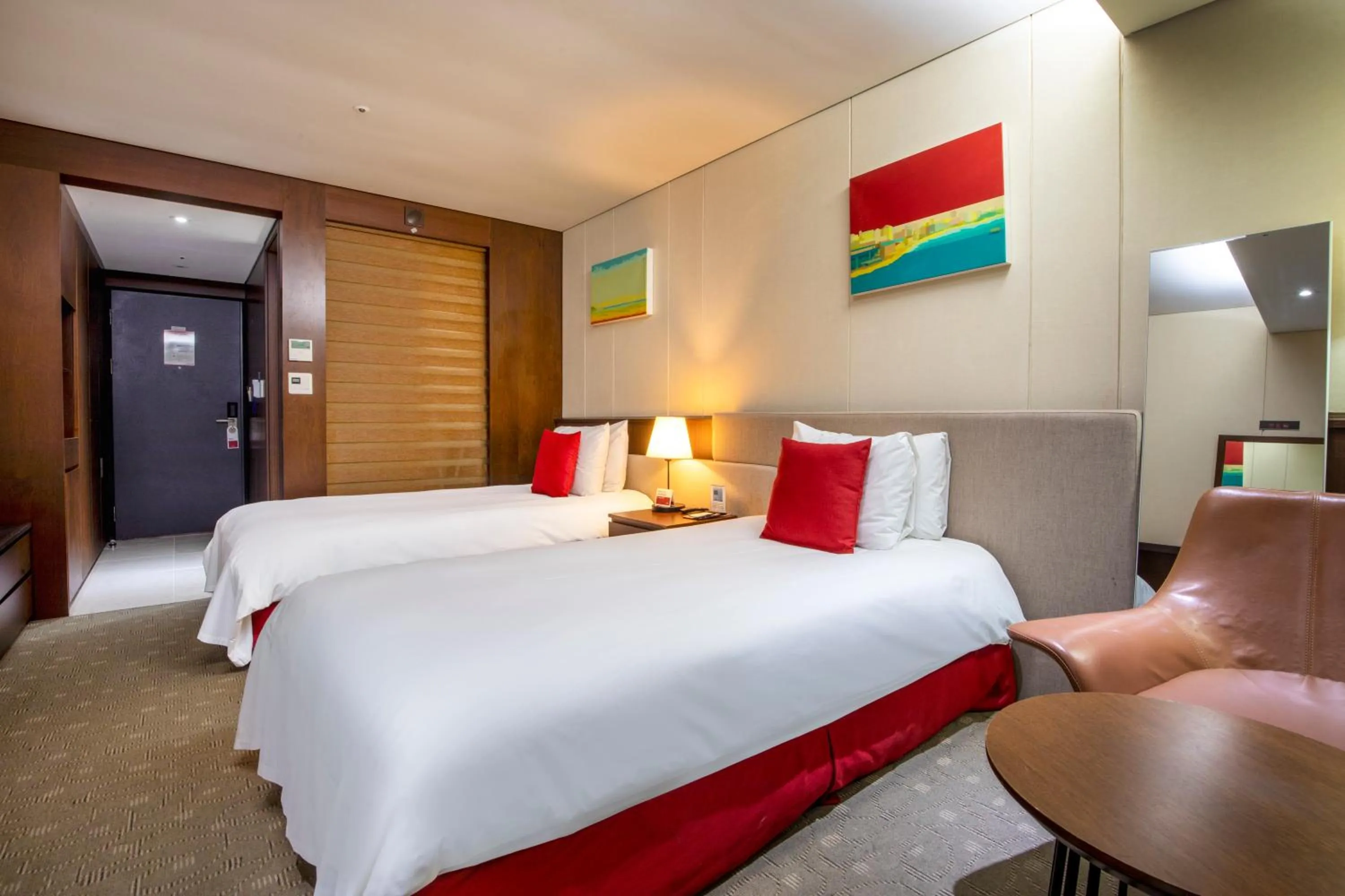 Bed in Ramada by Wyndham Jeju Hamdeok