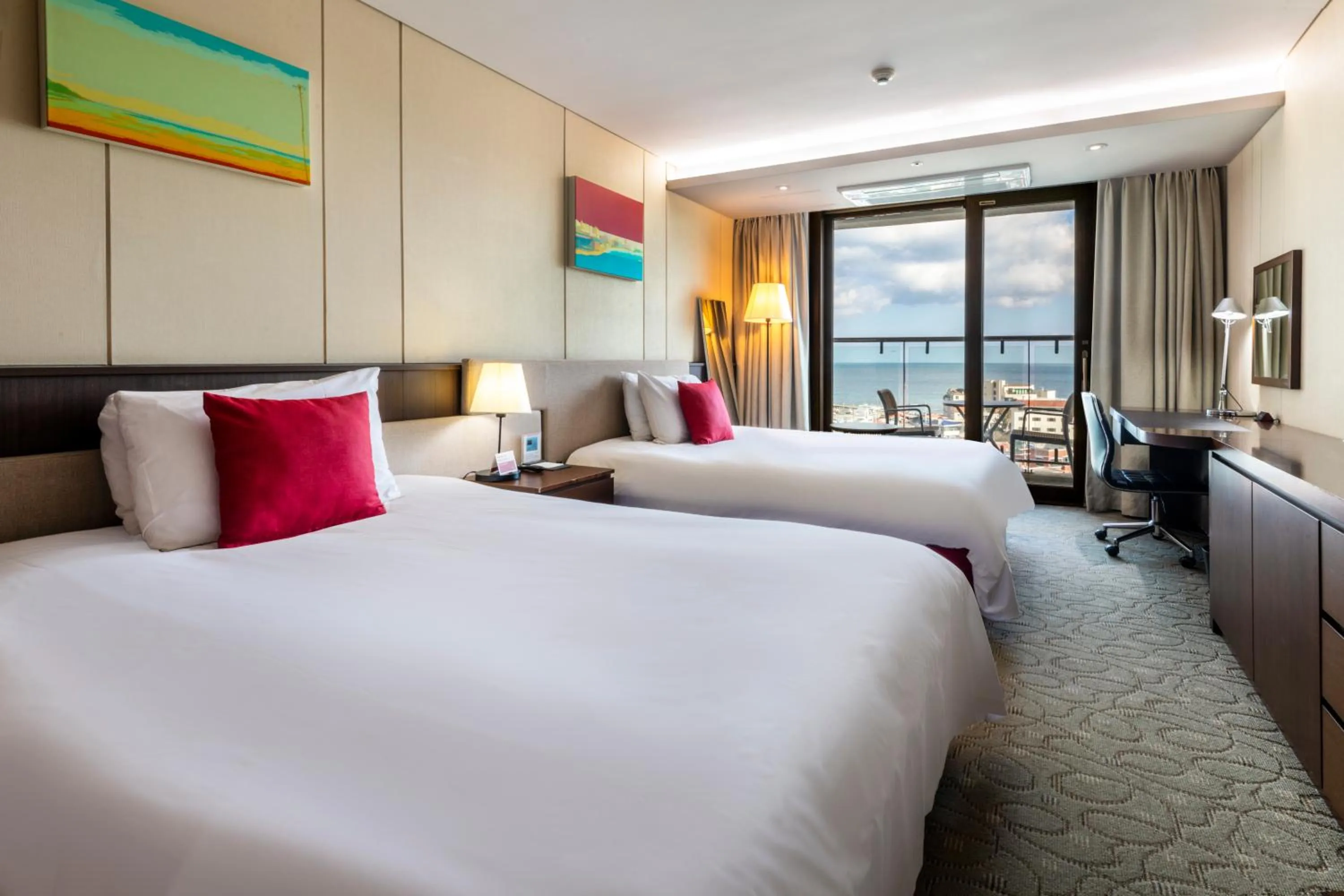 Bed in Ramada by Wyndham Jeju Hamdeok