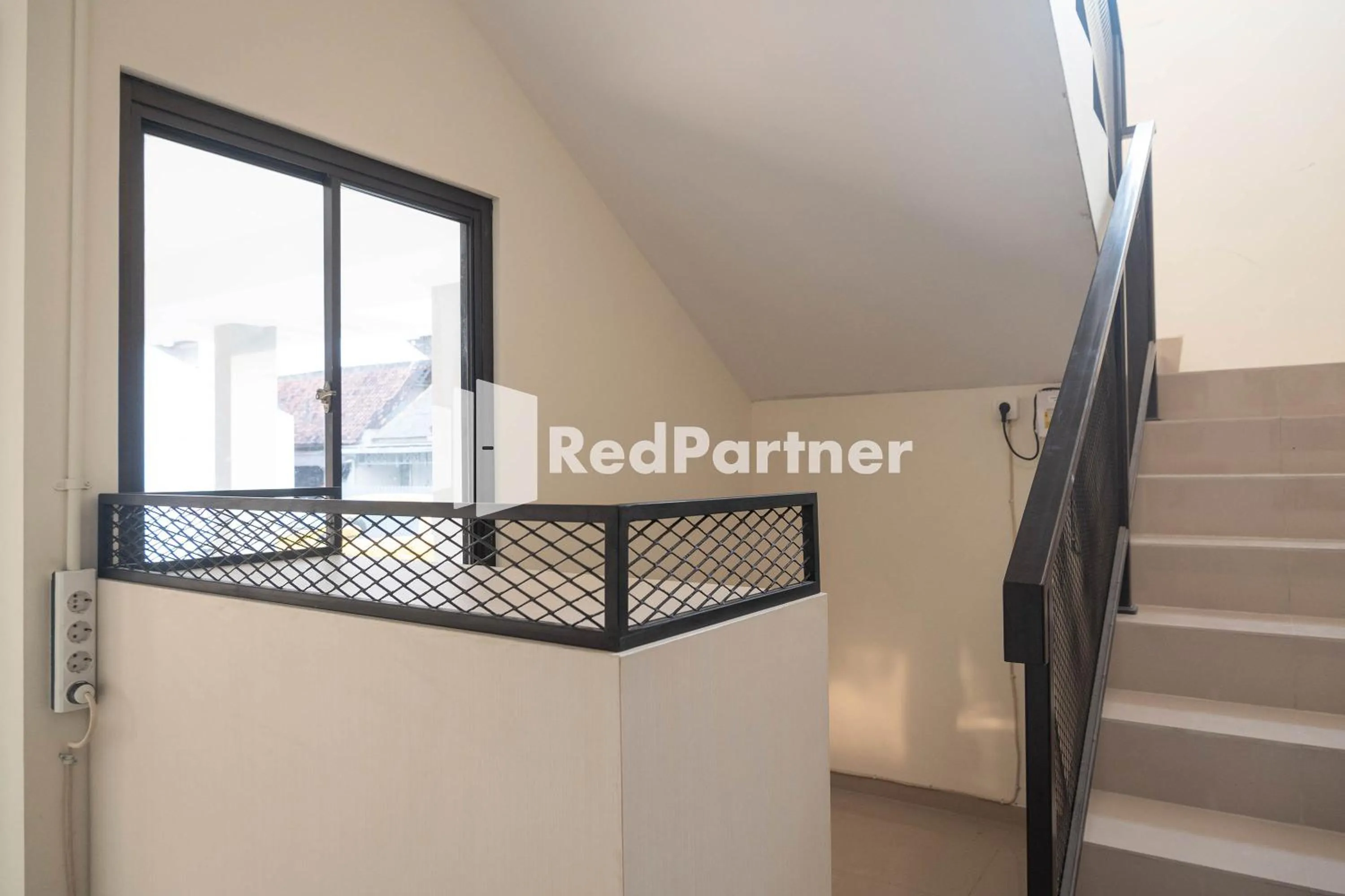 Property building in Astana Malioboro Mitra RedDoorz