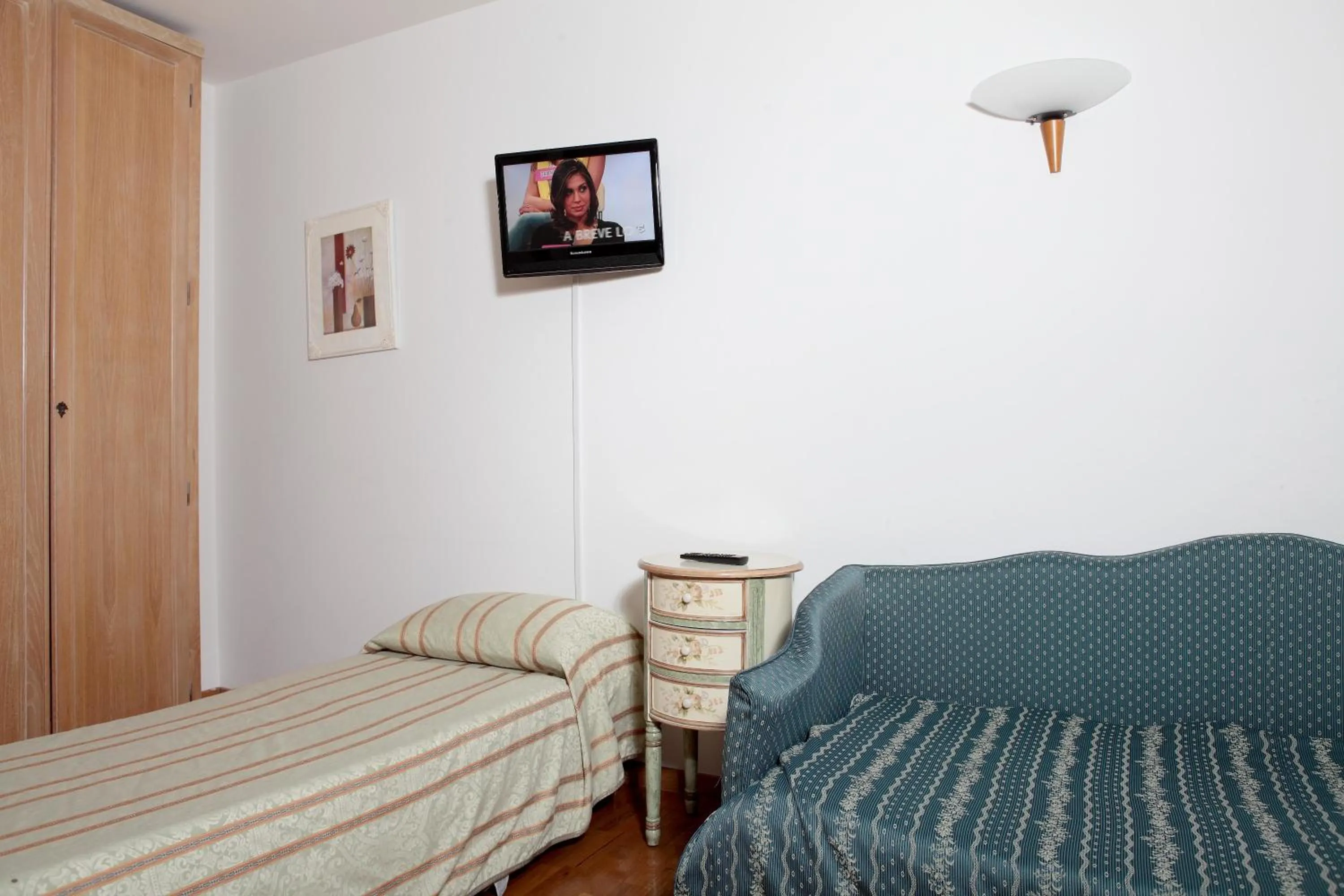 Bed in Hotel Donatello