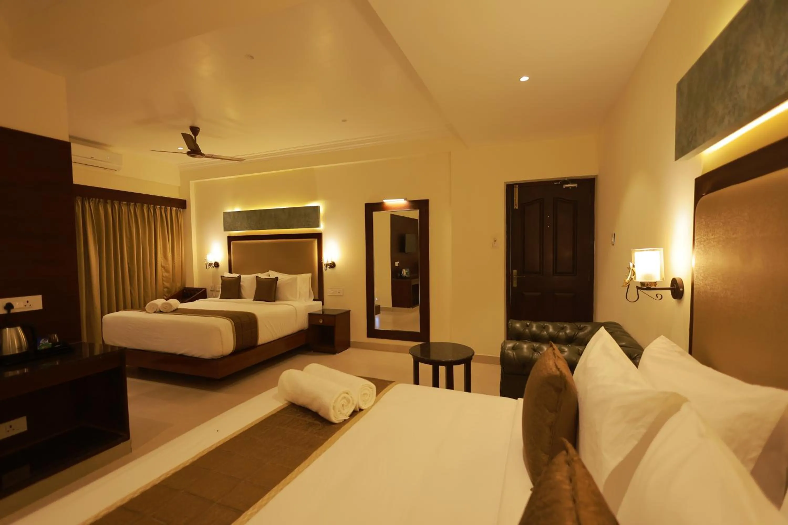 Bed in Hotel Comorin Grand