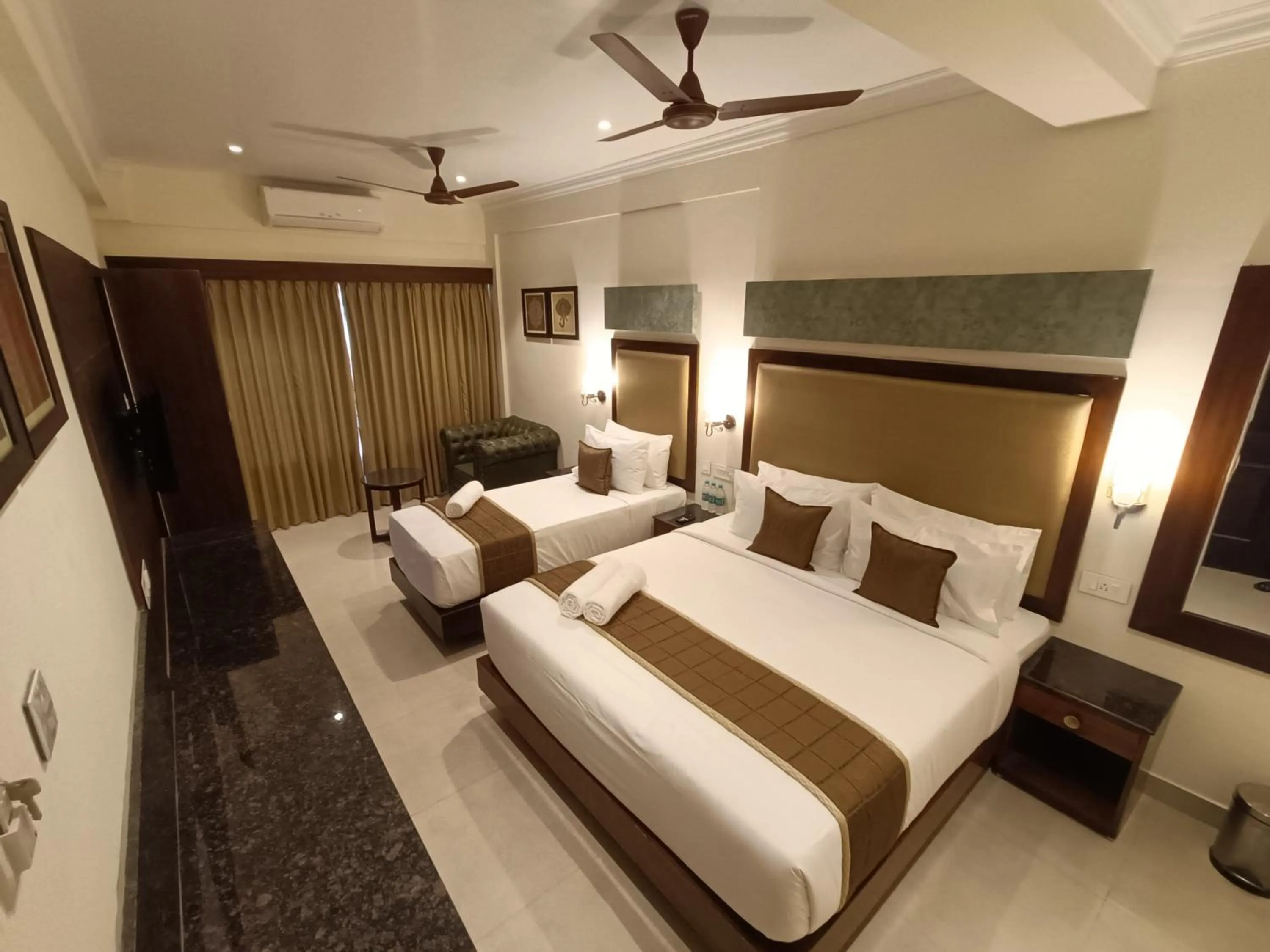 Bed in Hotel Comorin Grand