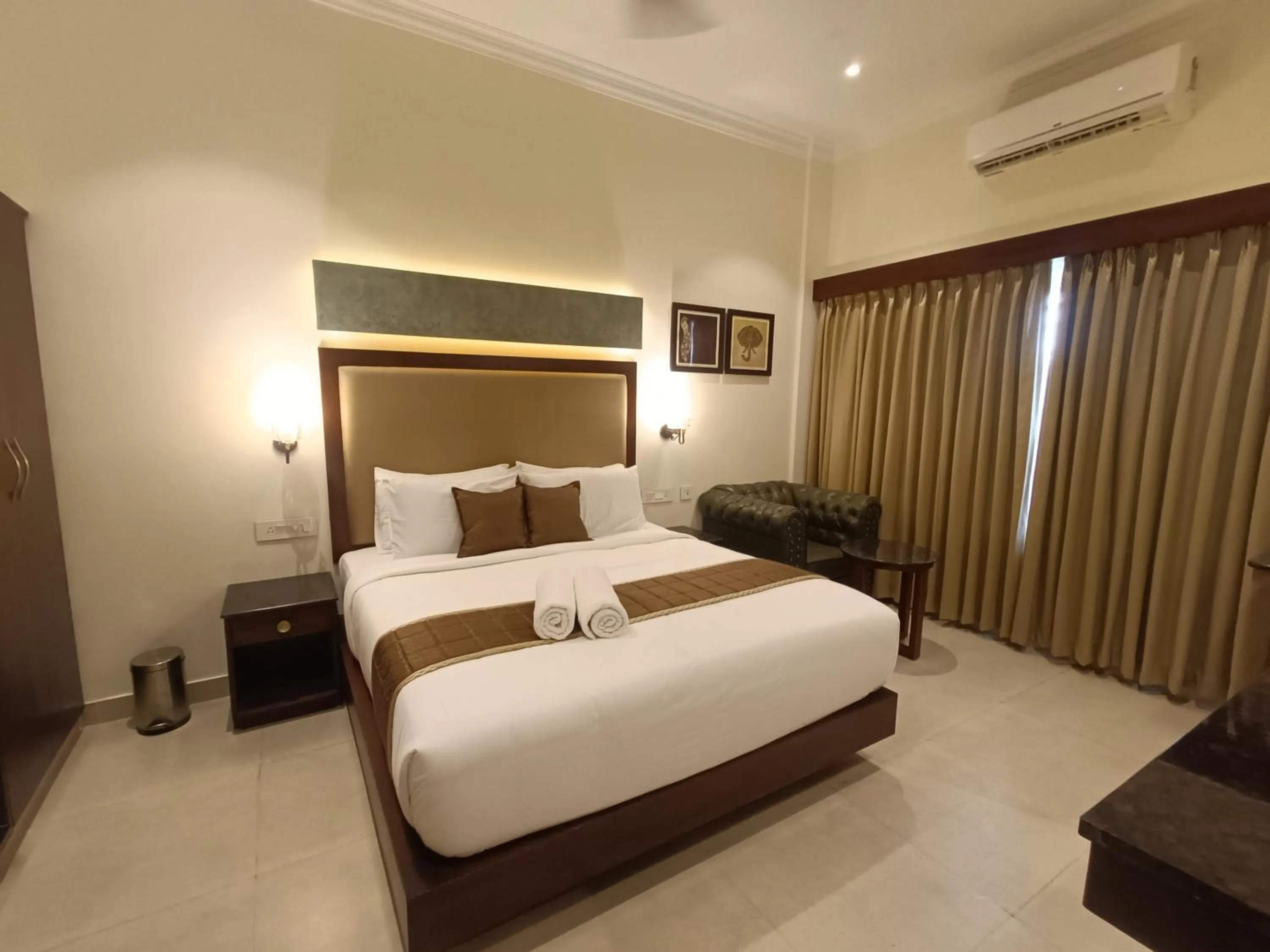 Bed in Hotel Comorin Grand