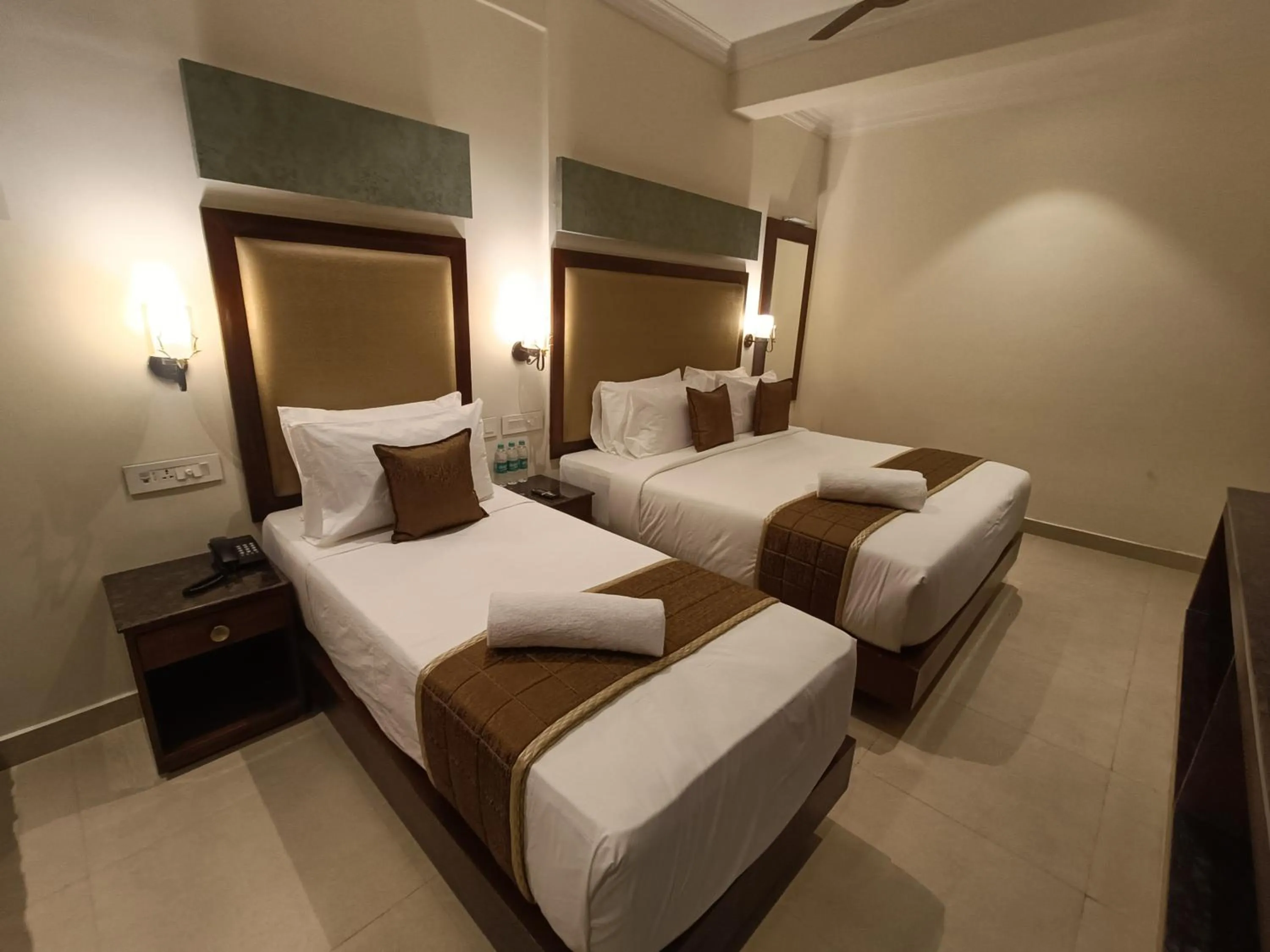 Bed in Hotel Comorin Grand