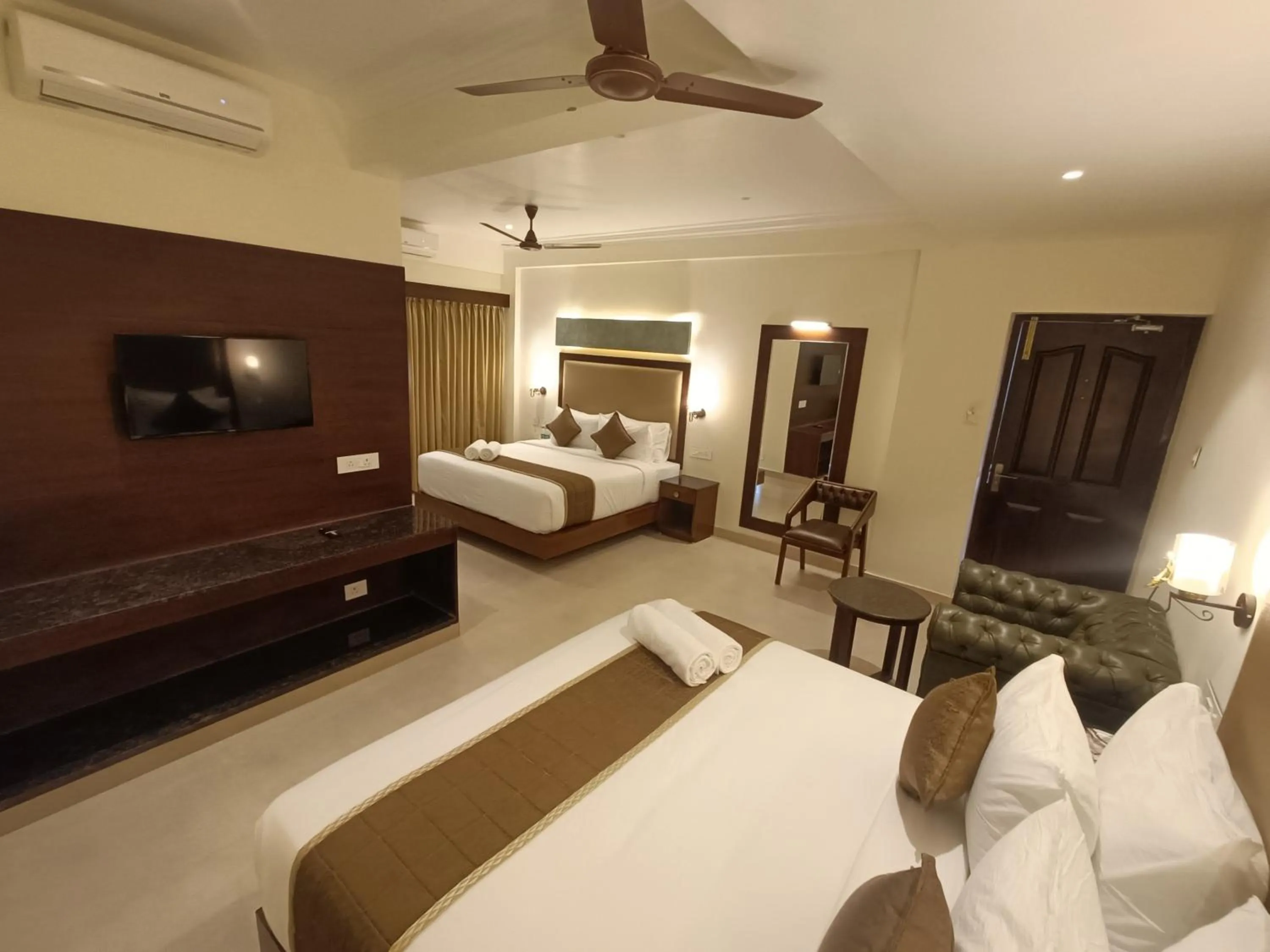 Bed in Hotel Comorin Grand