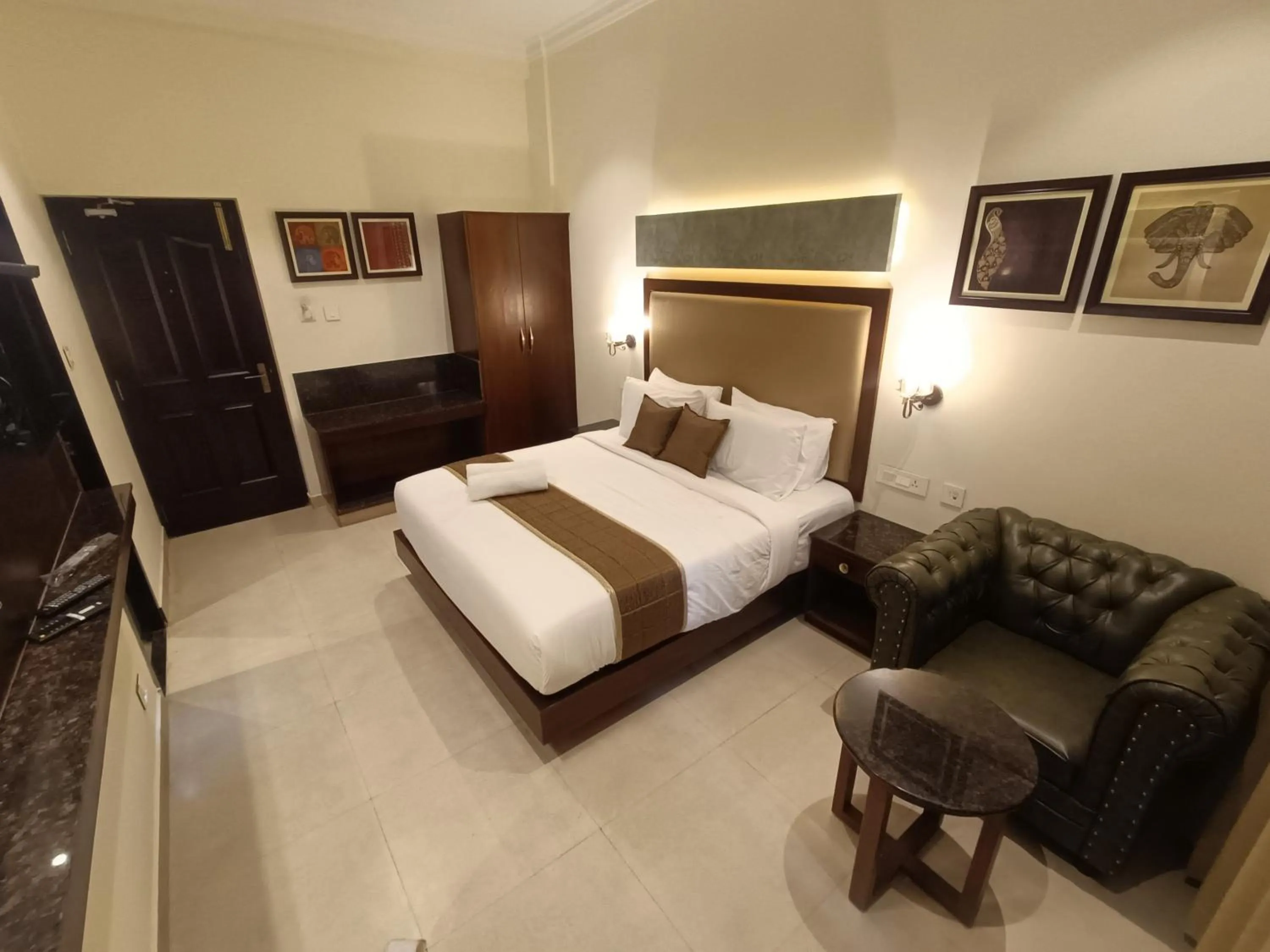 Bed in Hotel Comorin Grand