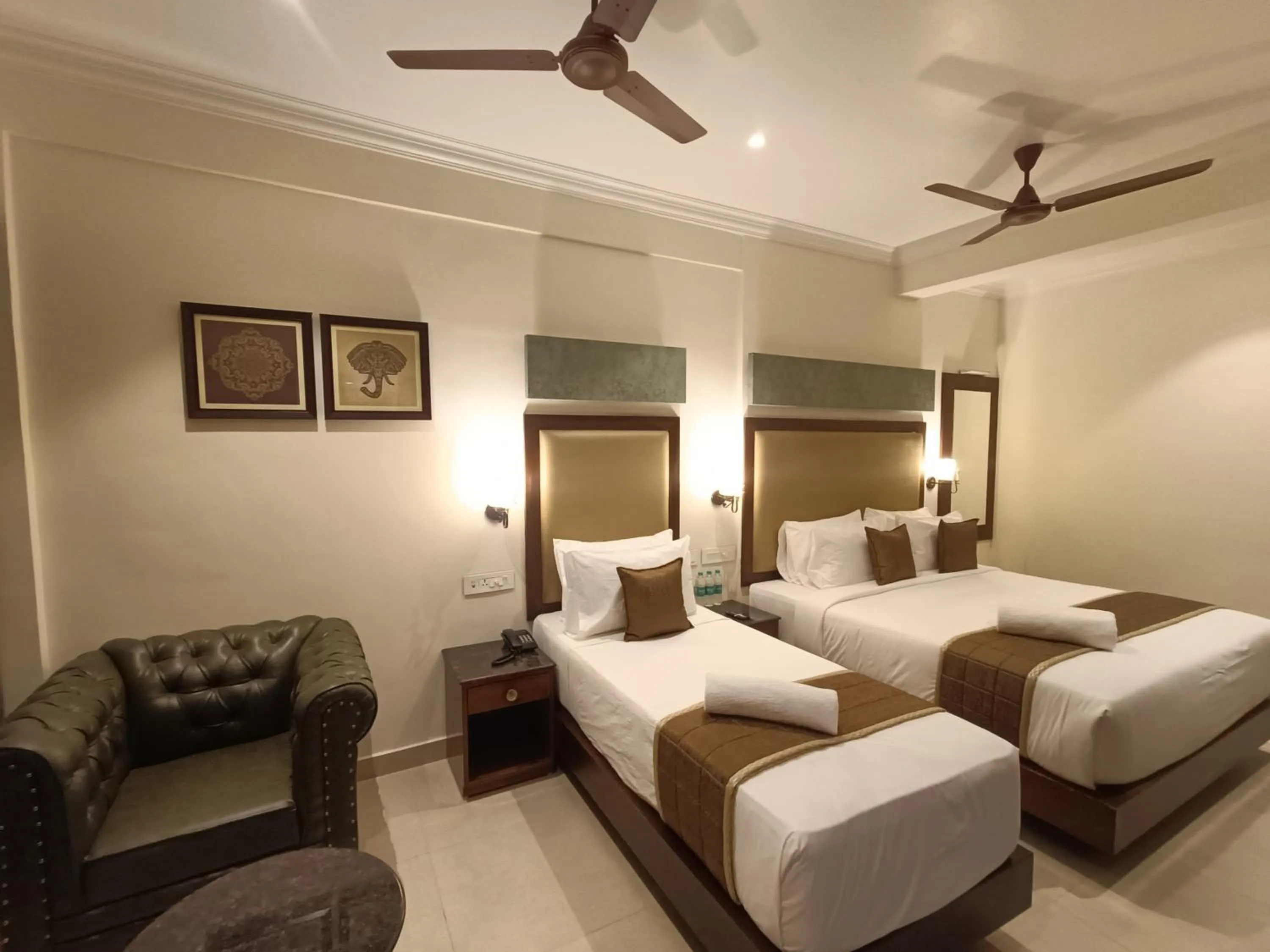 Bed in Hotel Comorin Grand