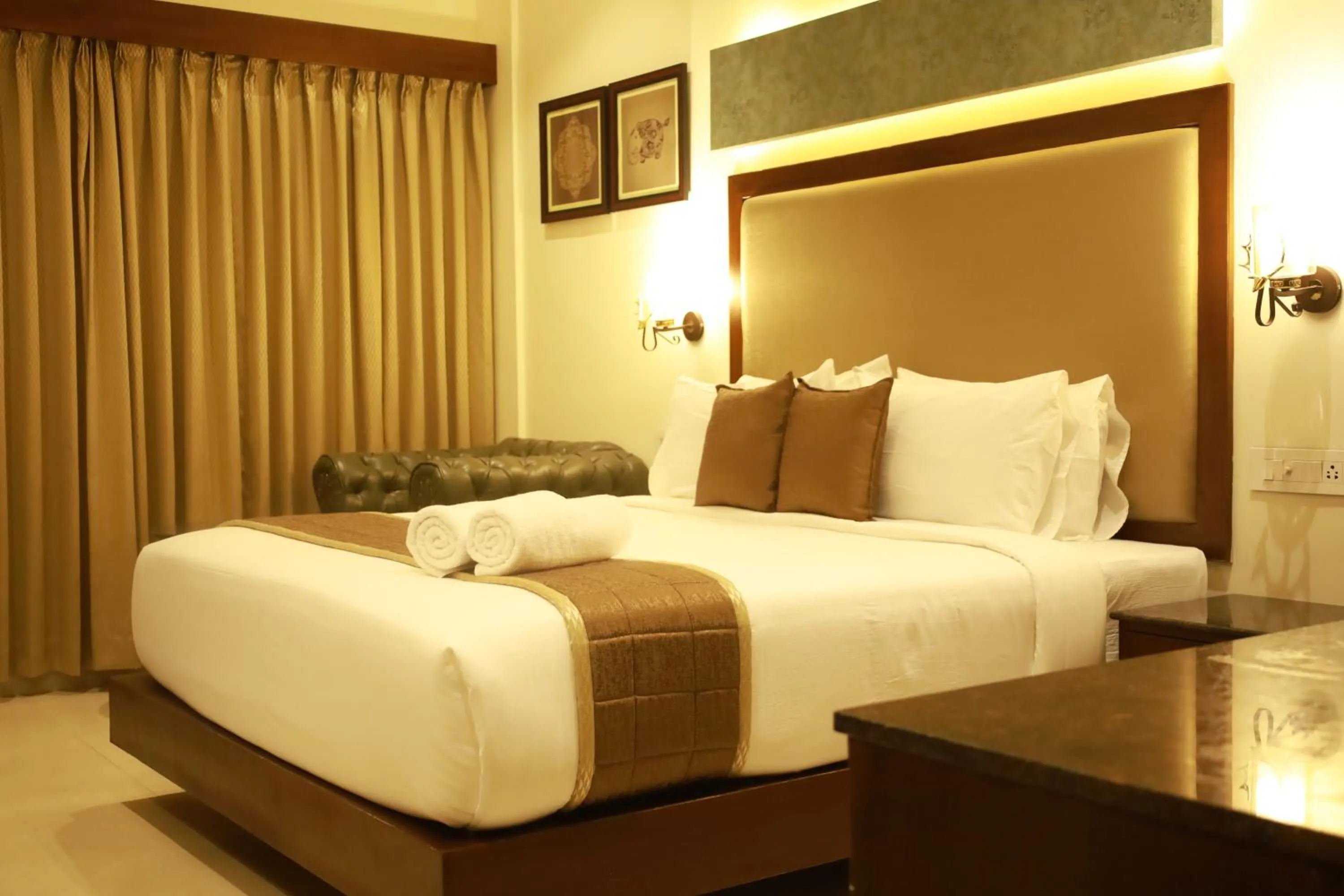 Bed in Hotel Comorin Grand