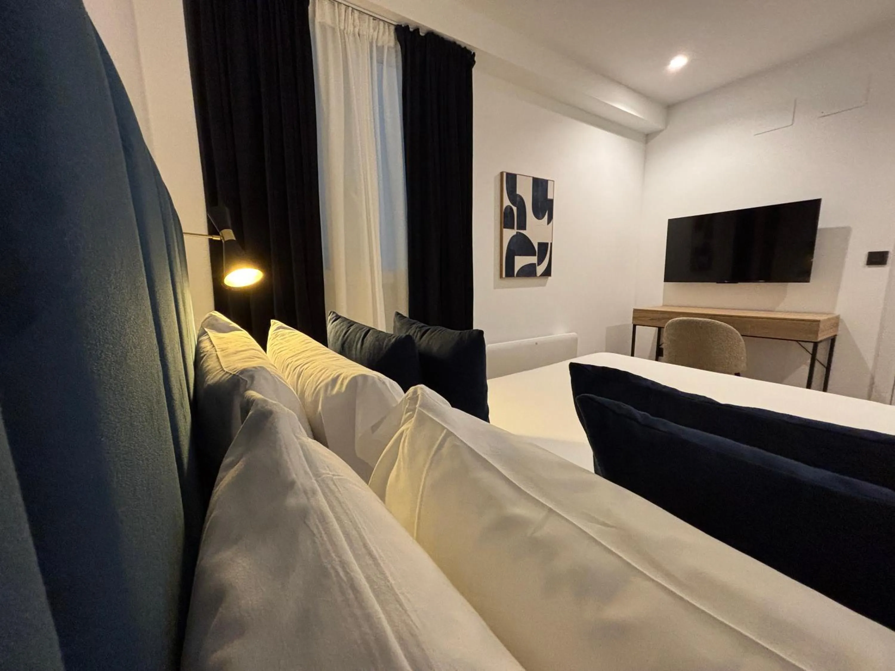 Bed in Arenal Suites Bilbao