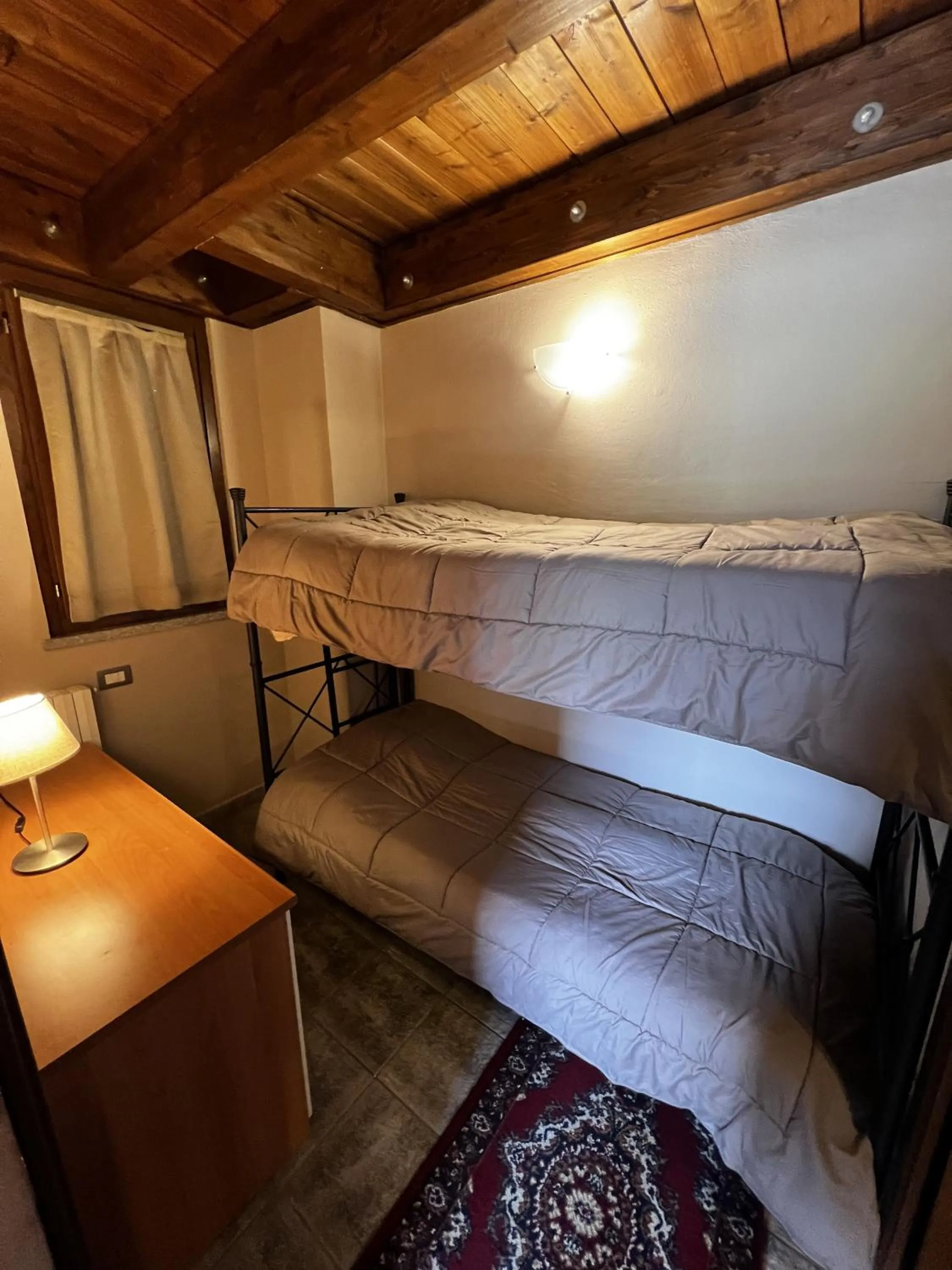 Bed in Chalet Edelweiss - Estella Hotel Collection