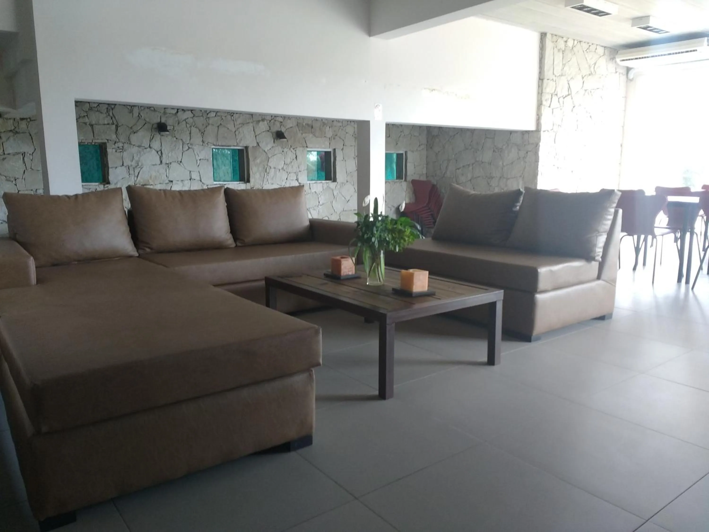 Communal lounge/ TV room in Jaina Resort & Spa