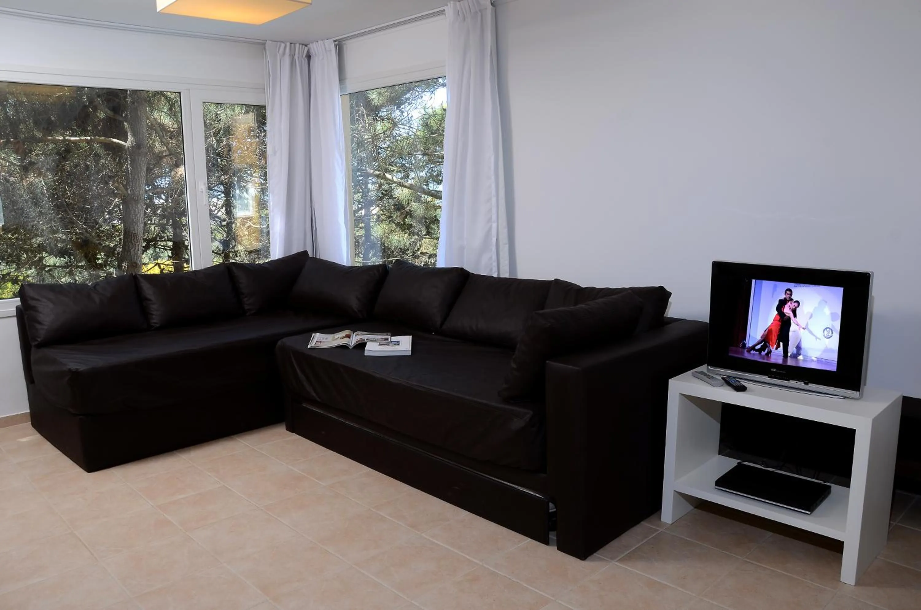 Communal lounge/ TV room in Jaina Resort & Spa