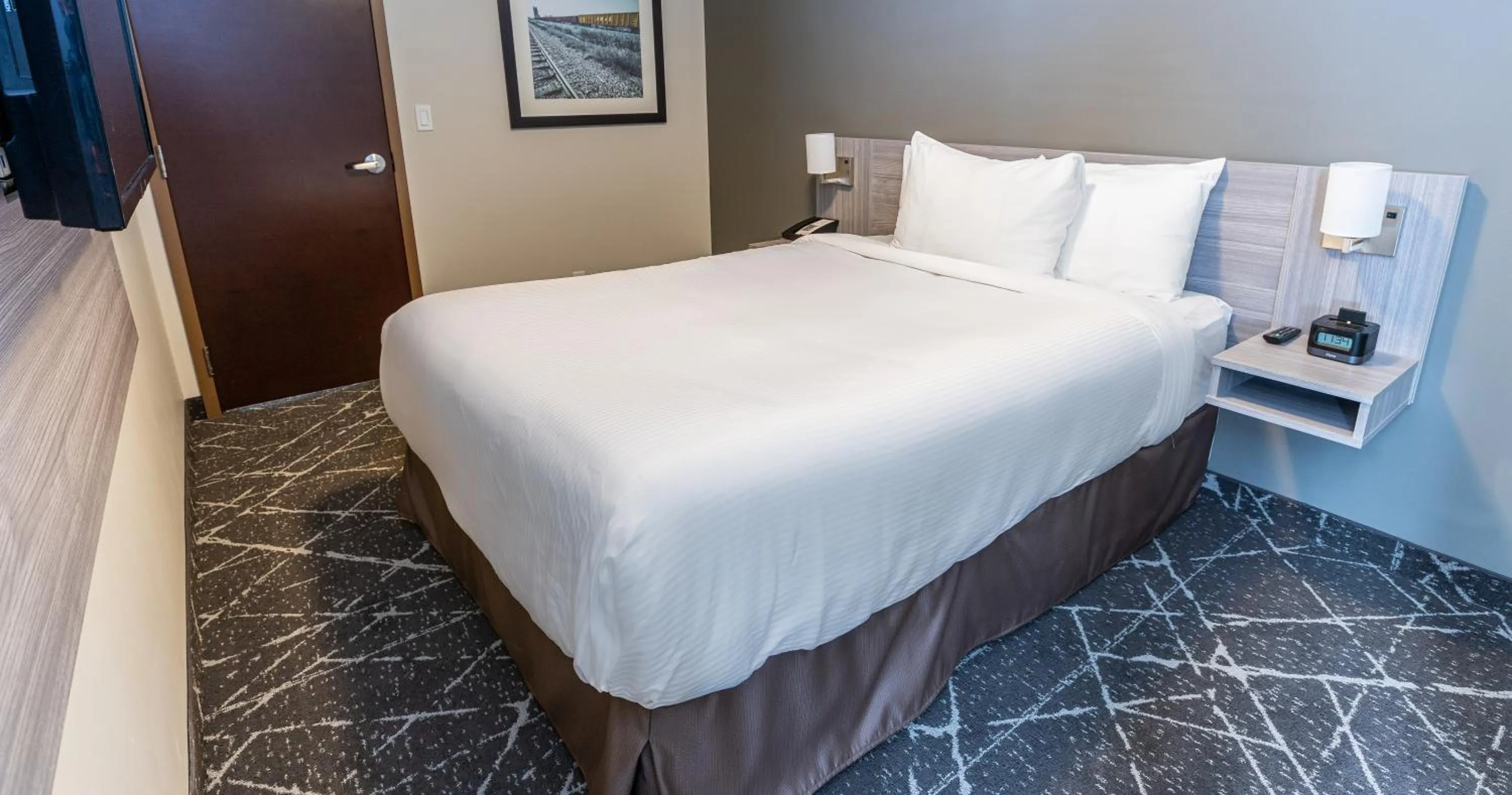Bed in Microtel Inn & Suites by Wyndham Lloydminster