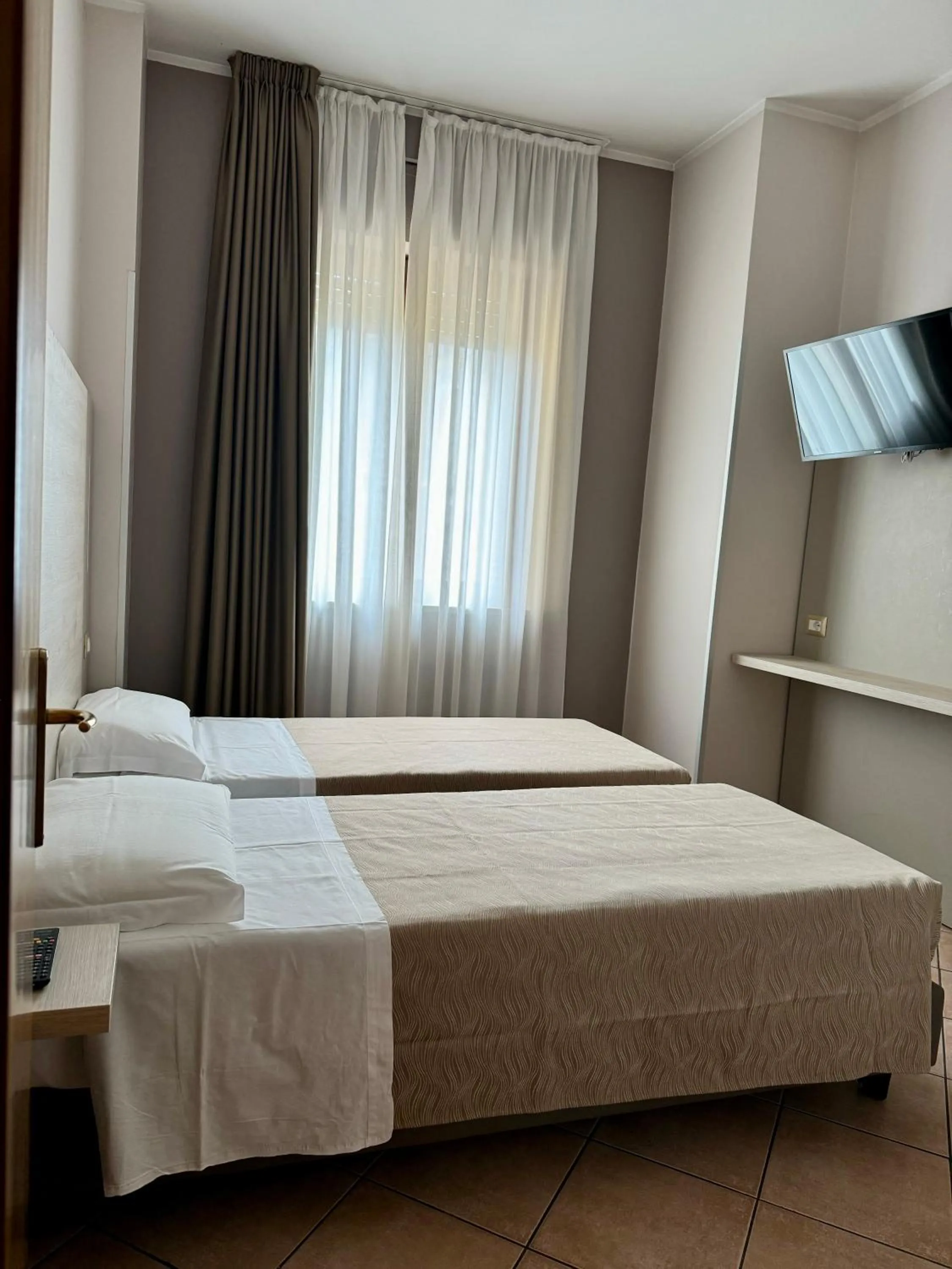 Bed in Hotel Miramonti