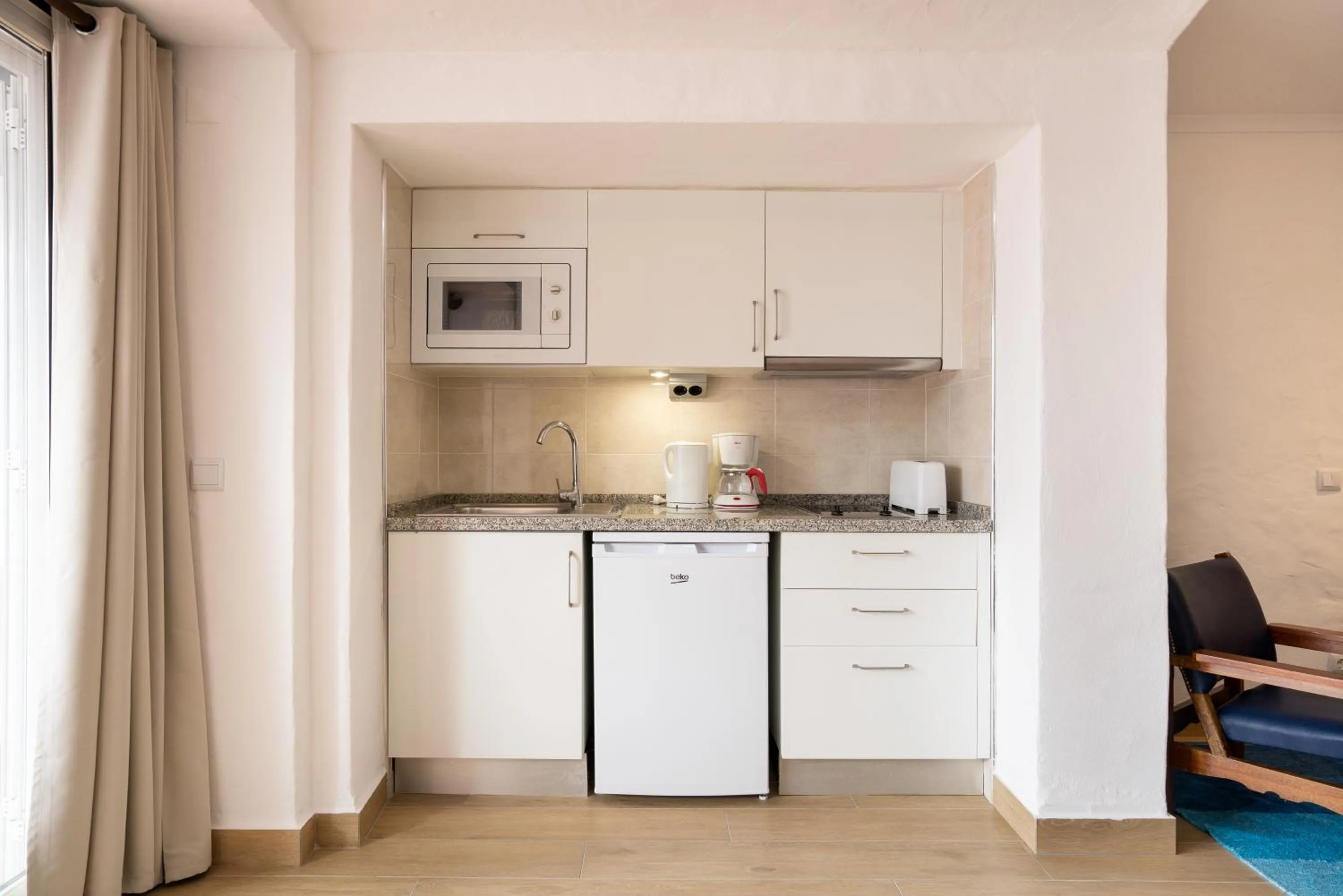 Kitchen or kitchenette in Apartamentos Borda D´Agua