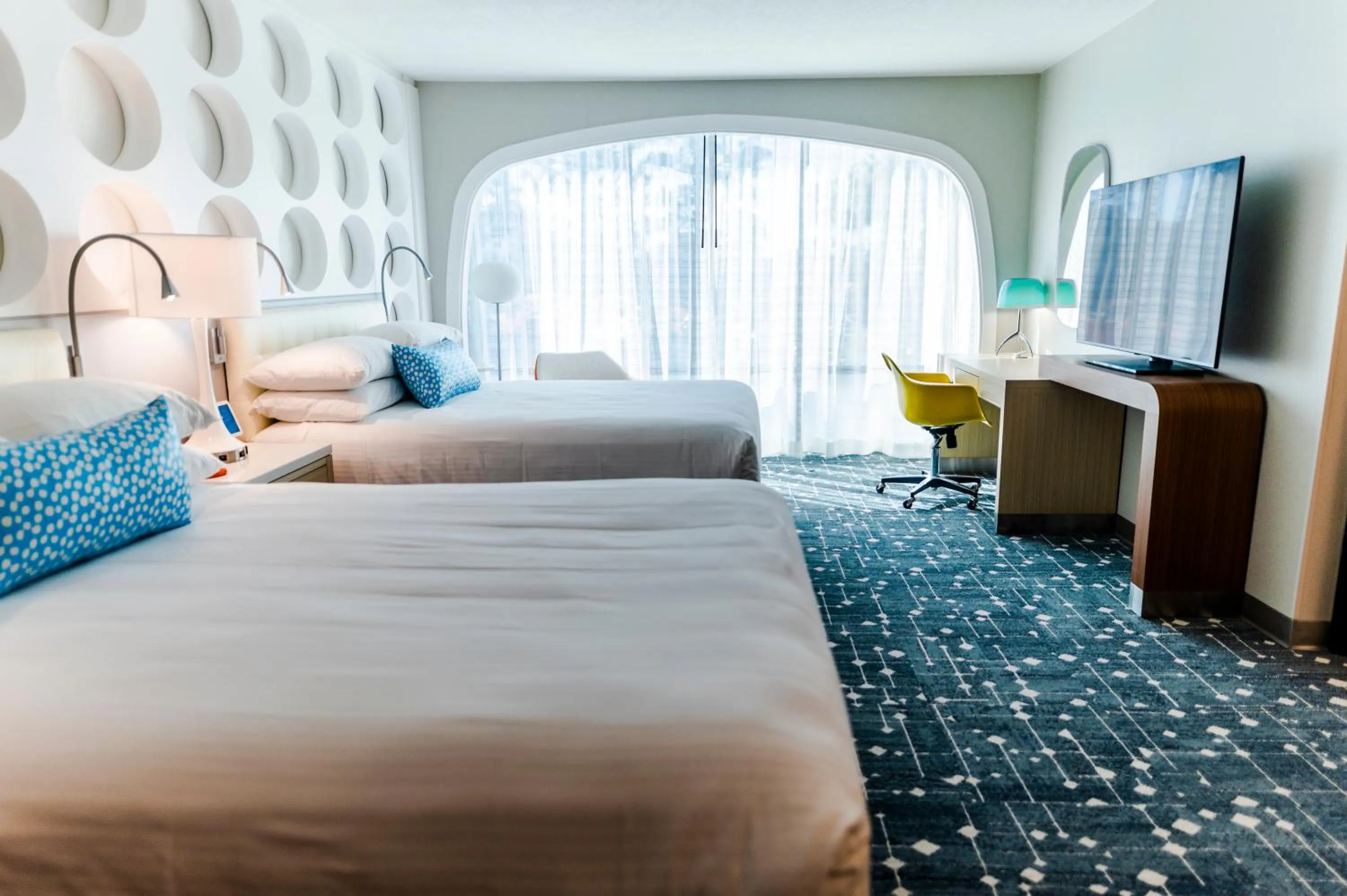 Bed in Howard Johnson by Wyndham Anaheim Hotel and Water Playground