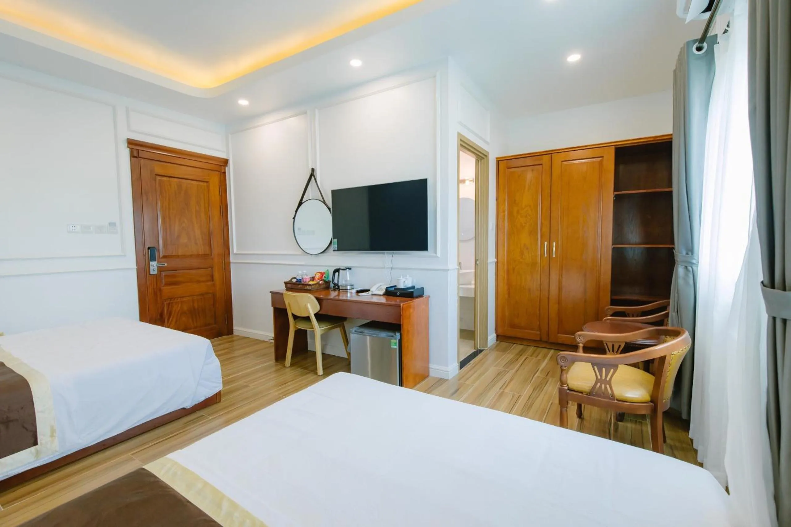 Communal lounge/ TV room, Bed in Thuận Phát Hotel