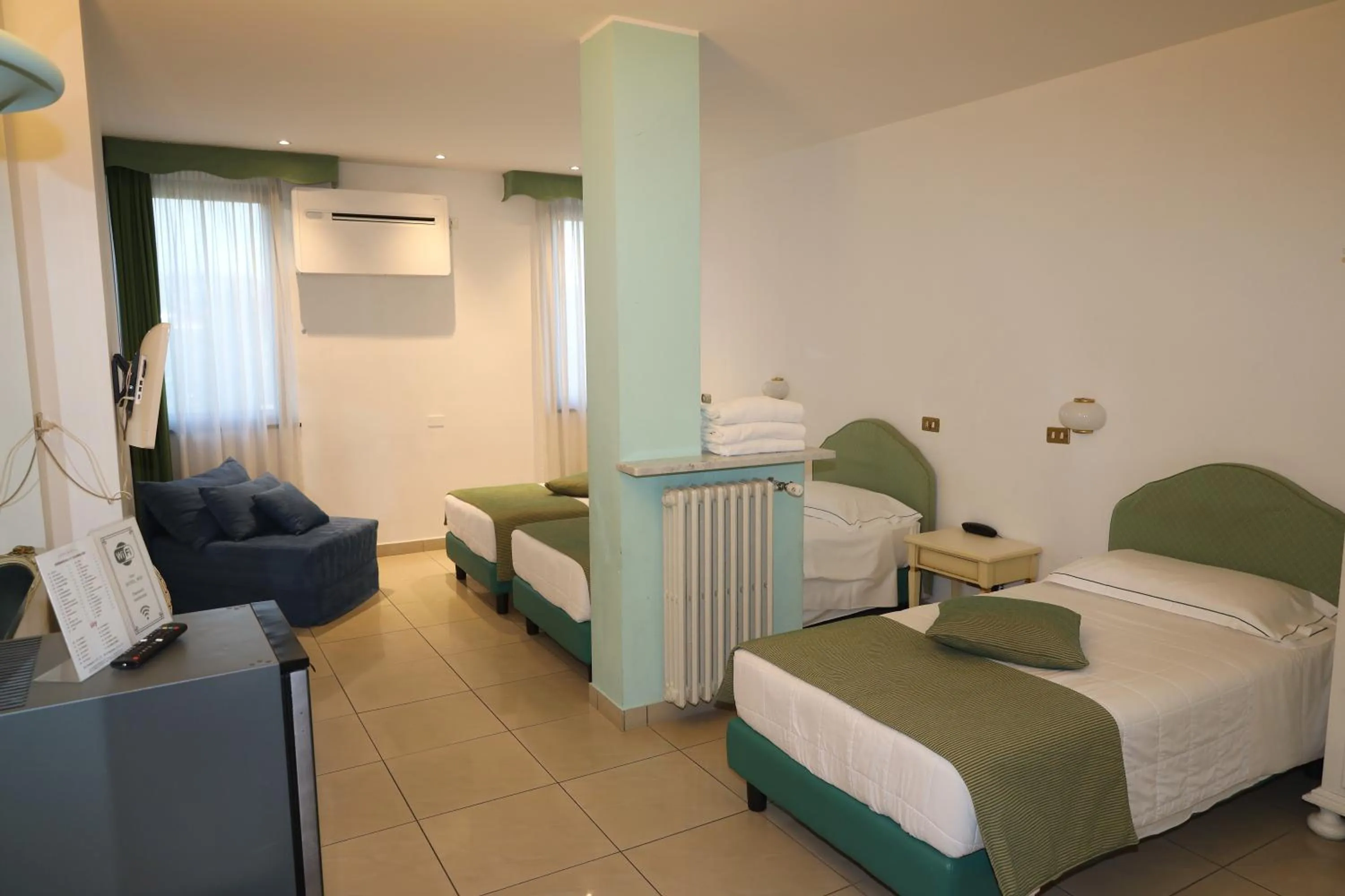 Photo of the whole room, Bed in Hotel Ristorante Continental