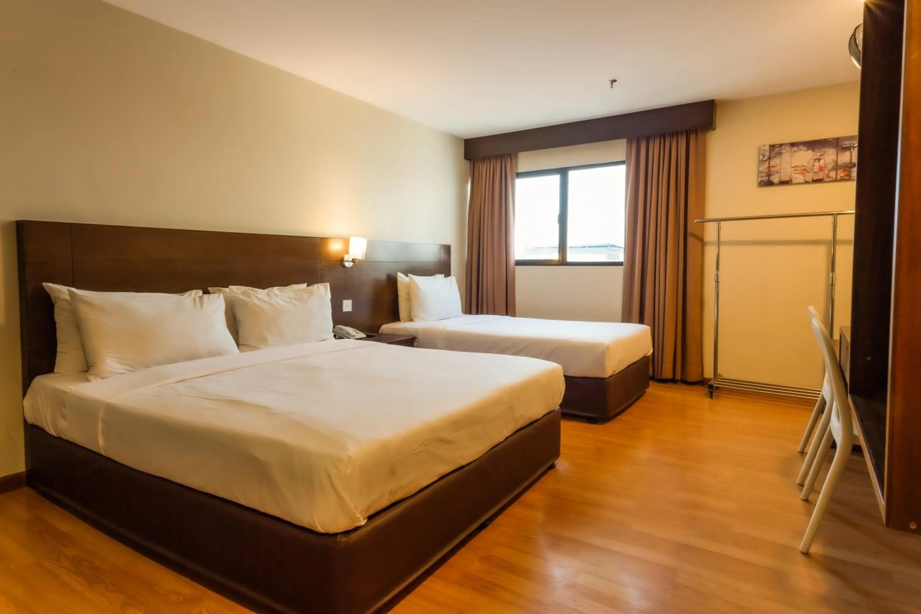 Bed in PP Hotel by Moxy