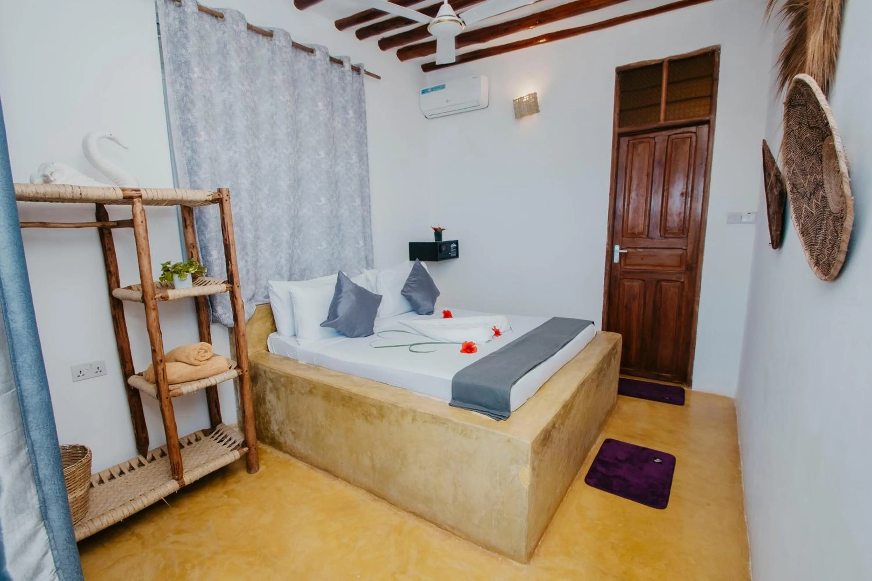 Bed in Equalia Rose Hotel