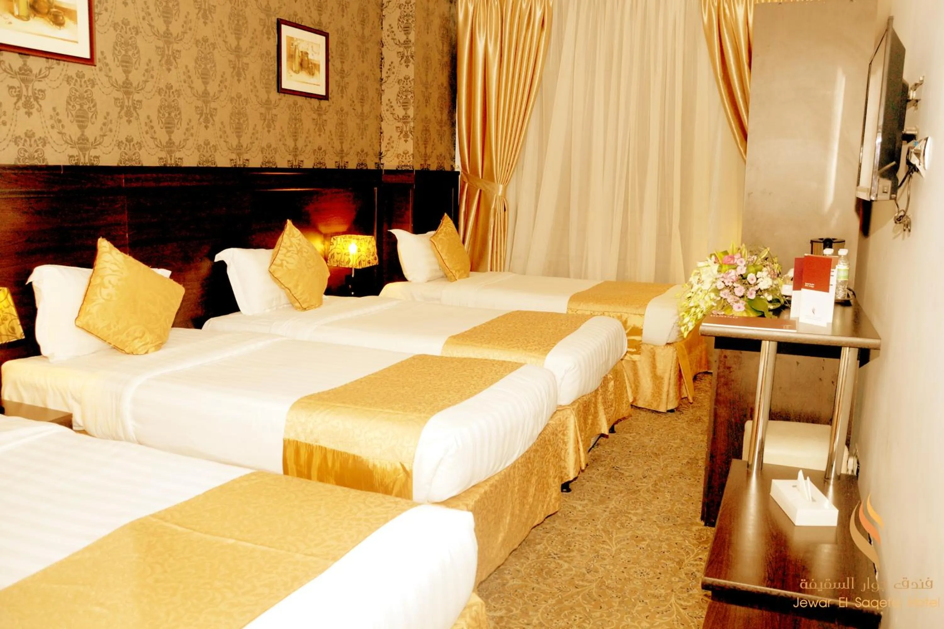 Bed in Deyar Al Eiman Hotel