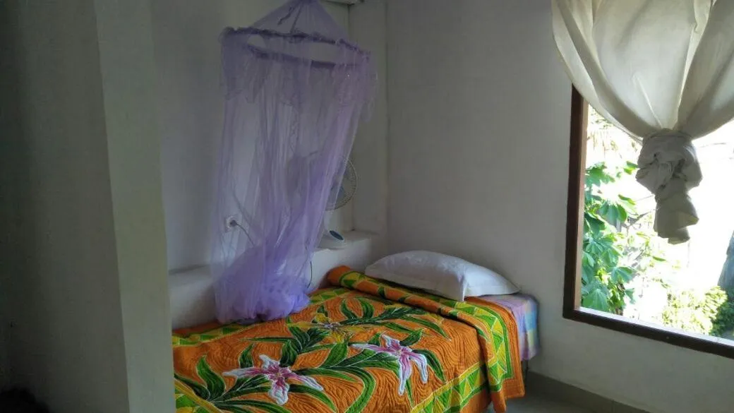 Bed in Bali Sari Homestay