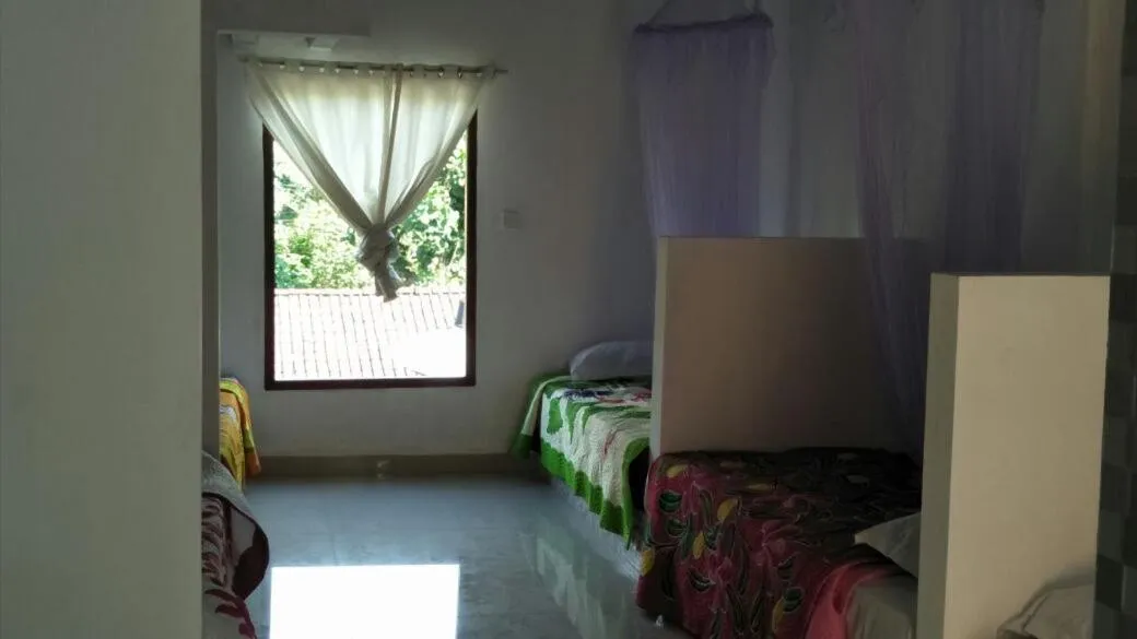 Bed in Bali Sari Homestay