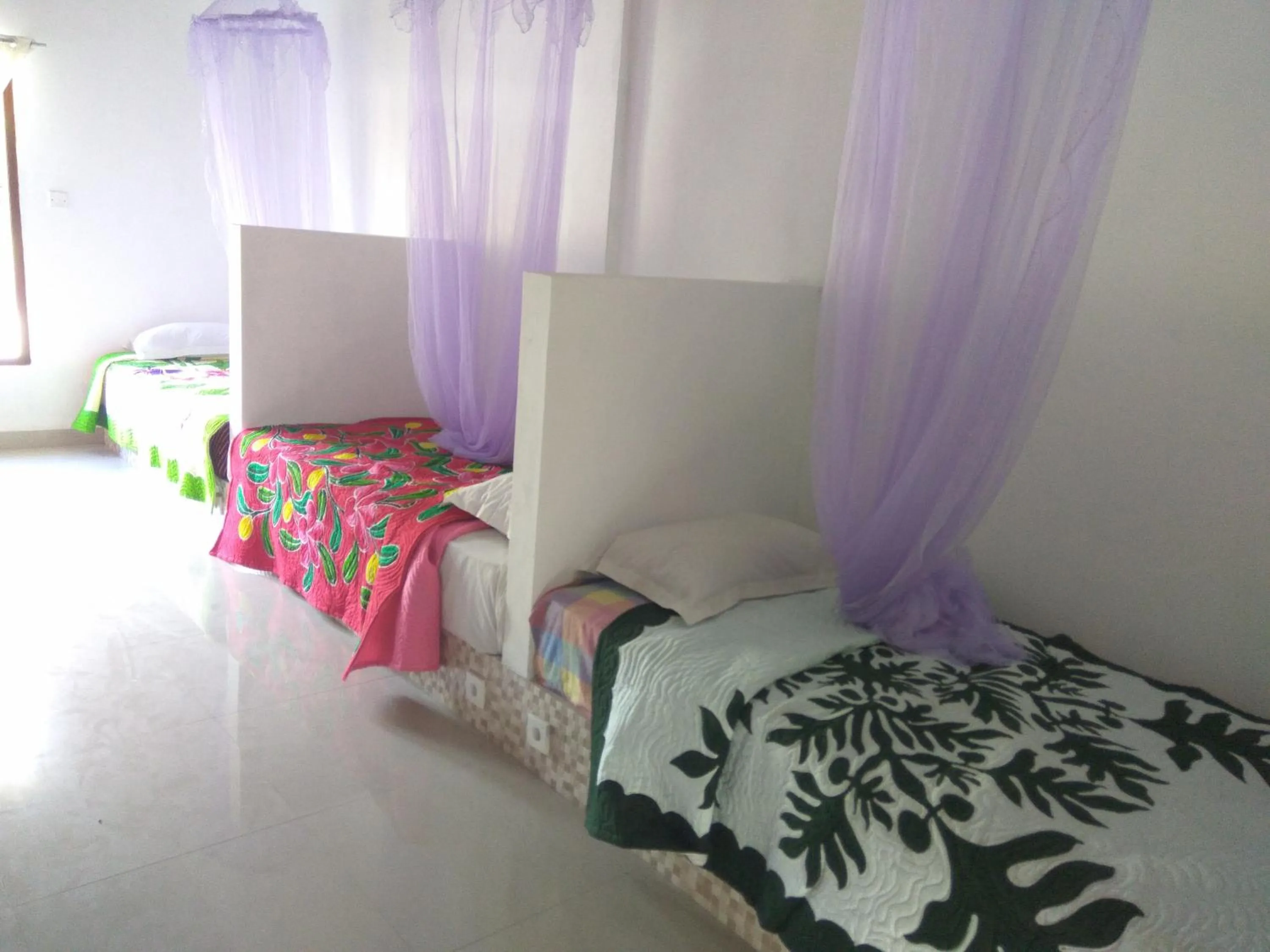 Bed in Bali Sari Homestay