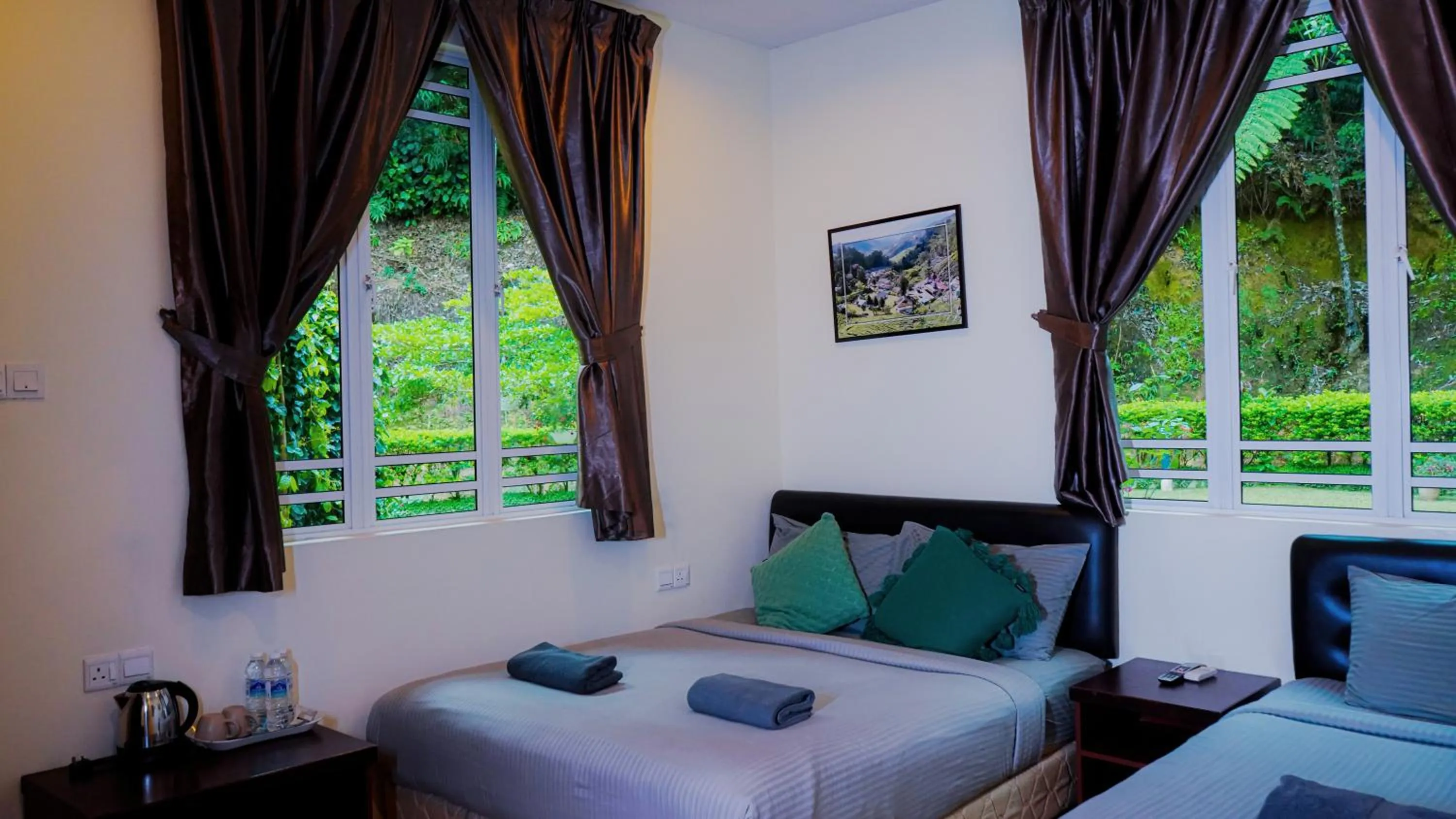 Bed in Highlanders Garden Guesthouse at Arundina Cameron Highlands